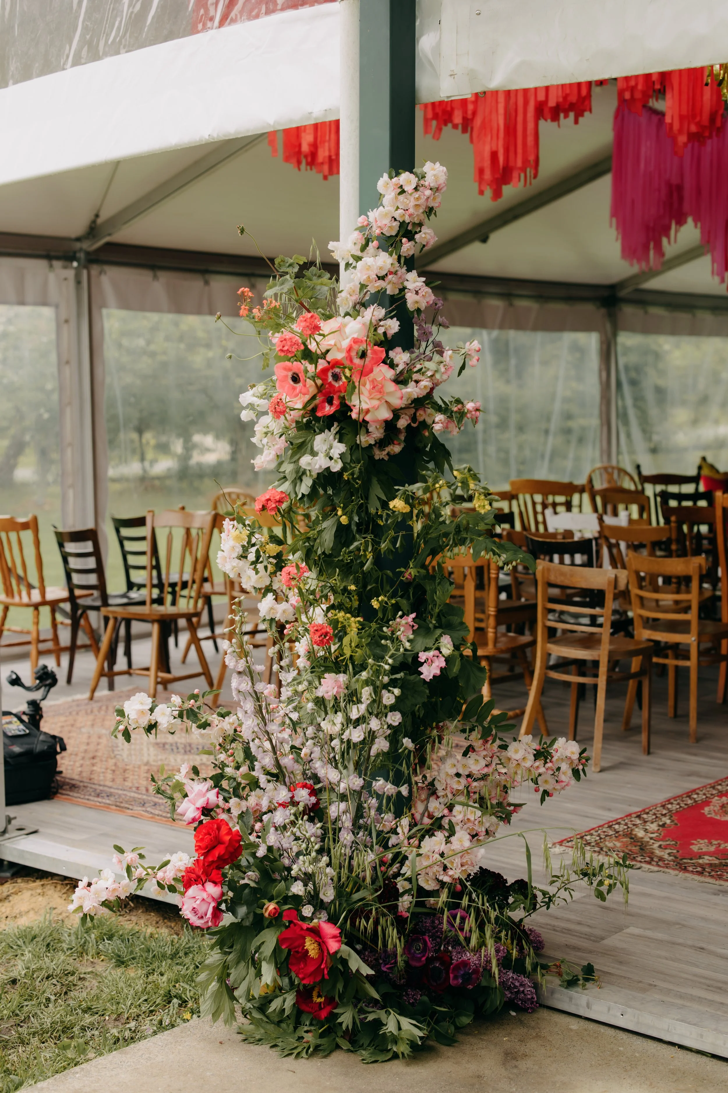 Large growing ceremony pole installation for Honey Honey couple Jordan and Chris's backyard wedding. Shot by Kyra Boyer Weddings