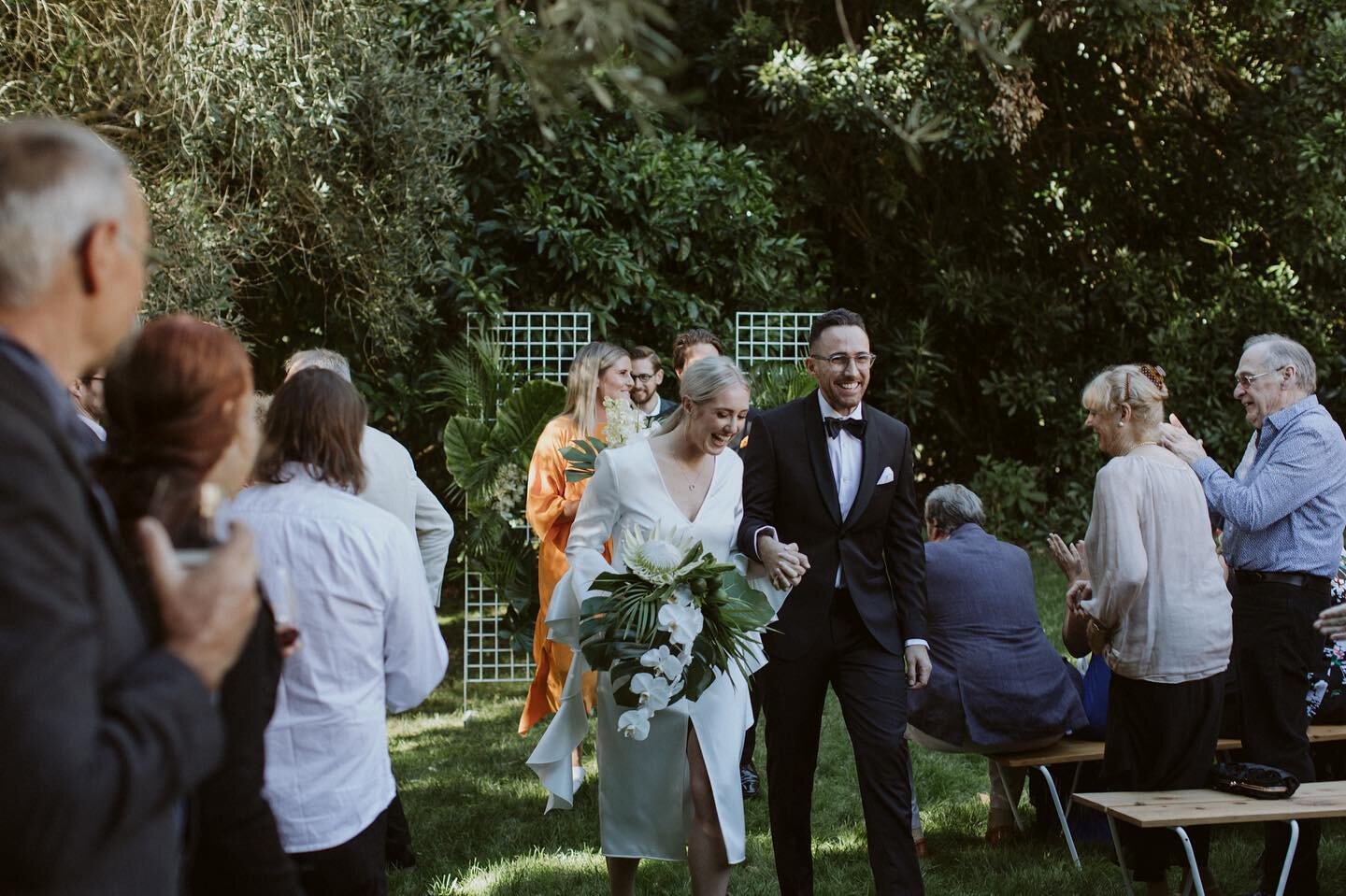 TOTAL JOY // The surreal feeling of walking back up the aisle as a married couple is like no other. If a joy-filled, fun, celebration is what you want for your wedding ceremony, get in touch! 🤍