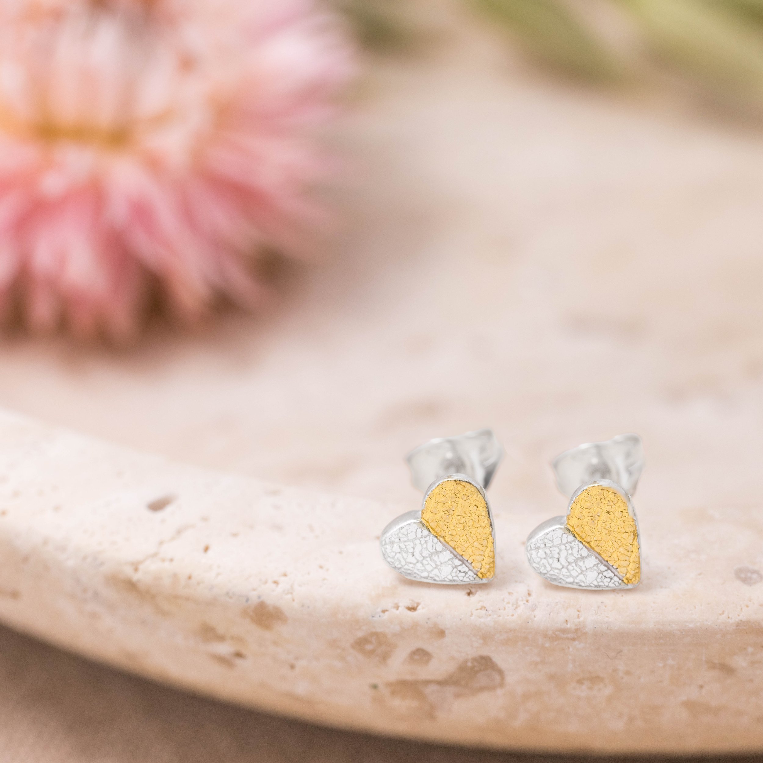 Mini sterling silver heart stud earrings with delicate leaf print texture and 24ct gold keum-boo accents.