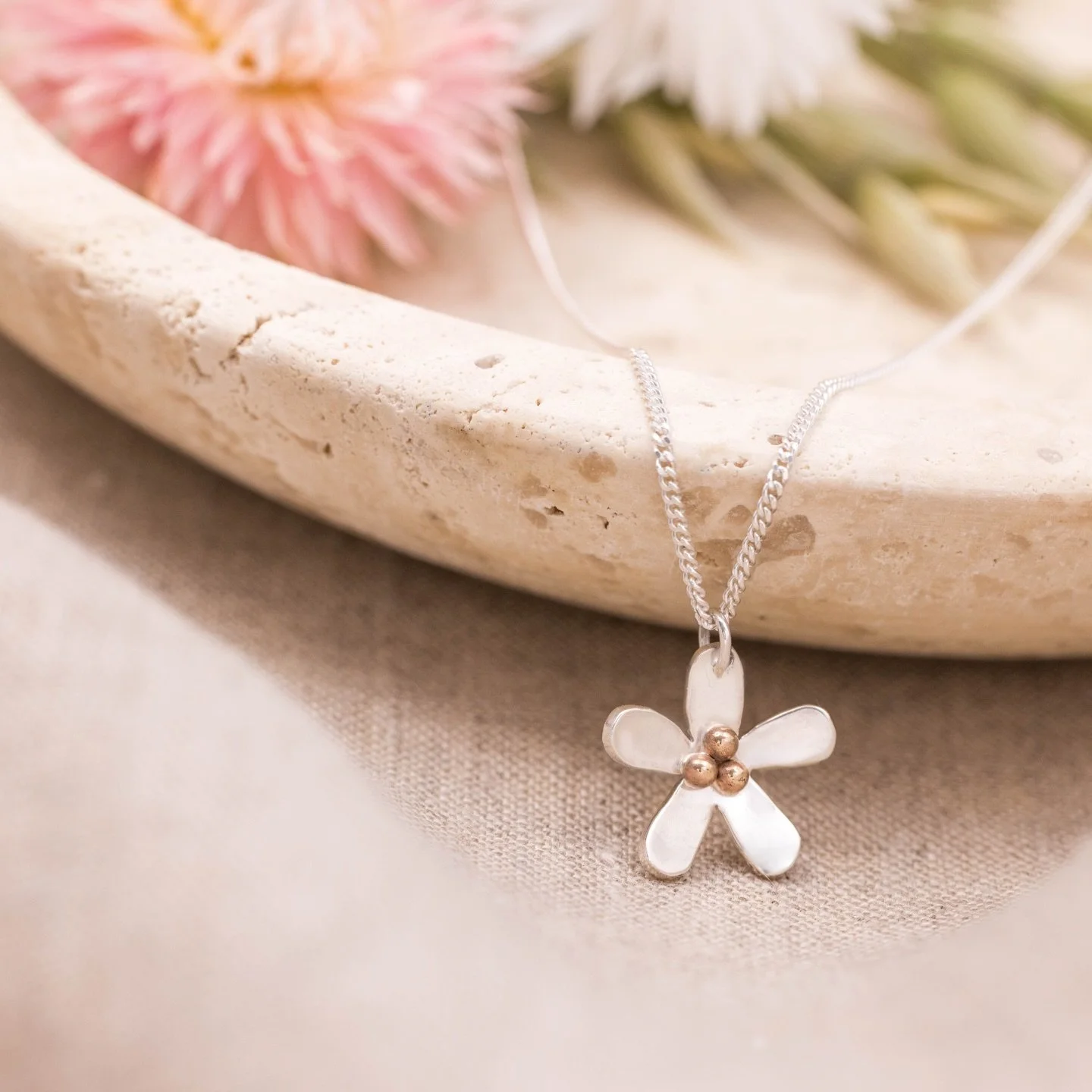 Spring is almost here 🌼✨And our Signature Daisy Collection is ready to bloom.

Each piece is handcrafted in sterling silver and 9ct gold, featuring delicate floral details that celebrate new beginnings. Think necklaces, earrings, and rings designed 
