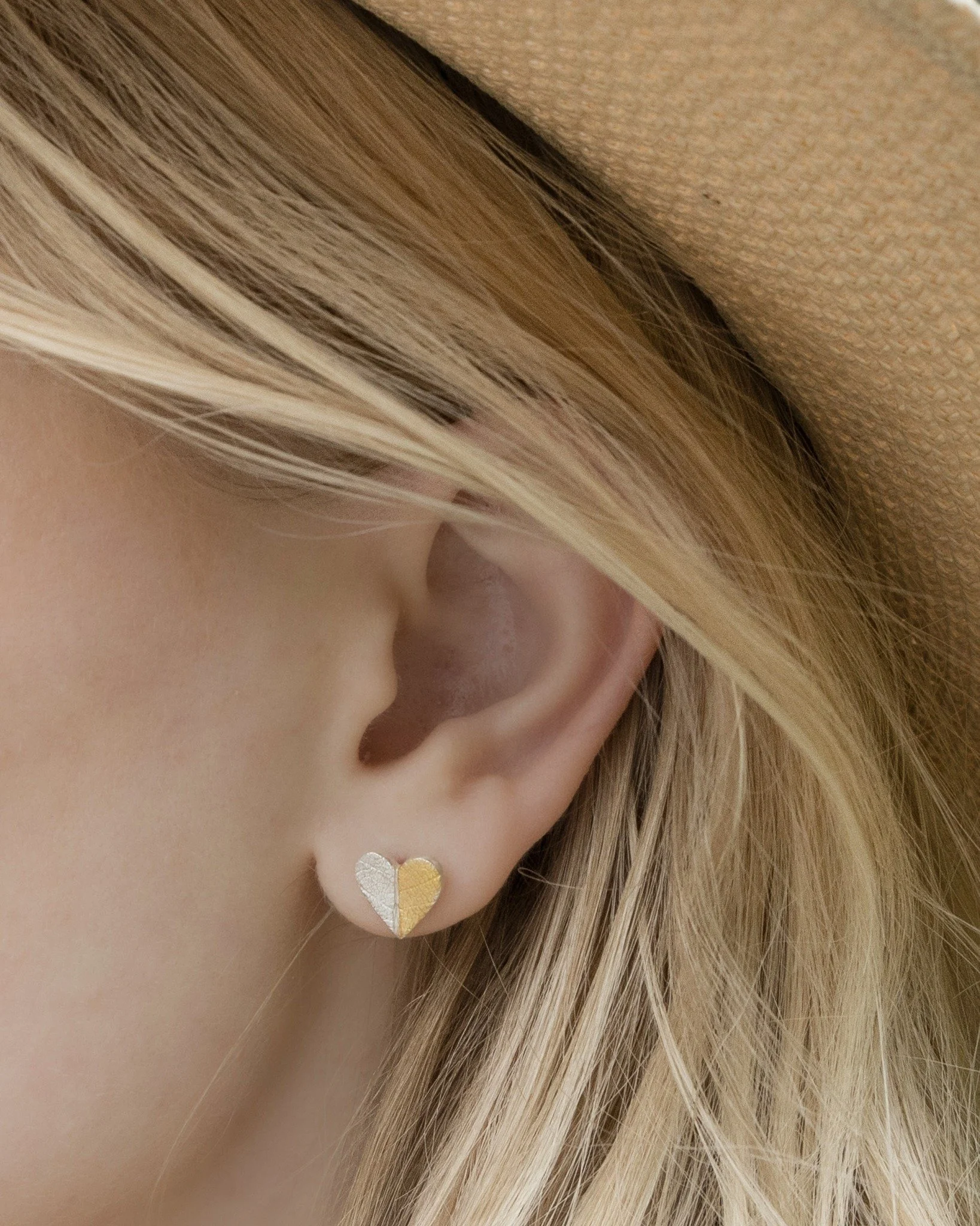A little heart of silver and gold 🤍✨

Delicate, understated and full of beautiful little details, our Silver &amp; Gold Leaf Print Heart Stud Earrings are a lovely addition to any jewellery collection.

Each tiny heart is individually handcrafted in