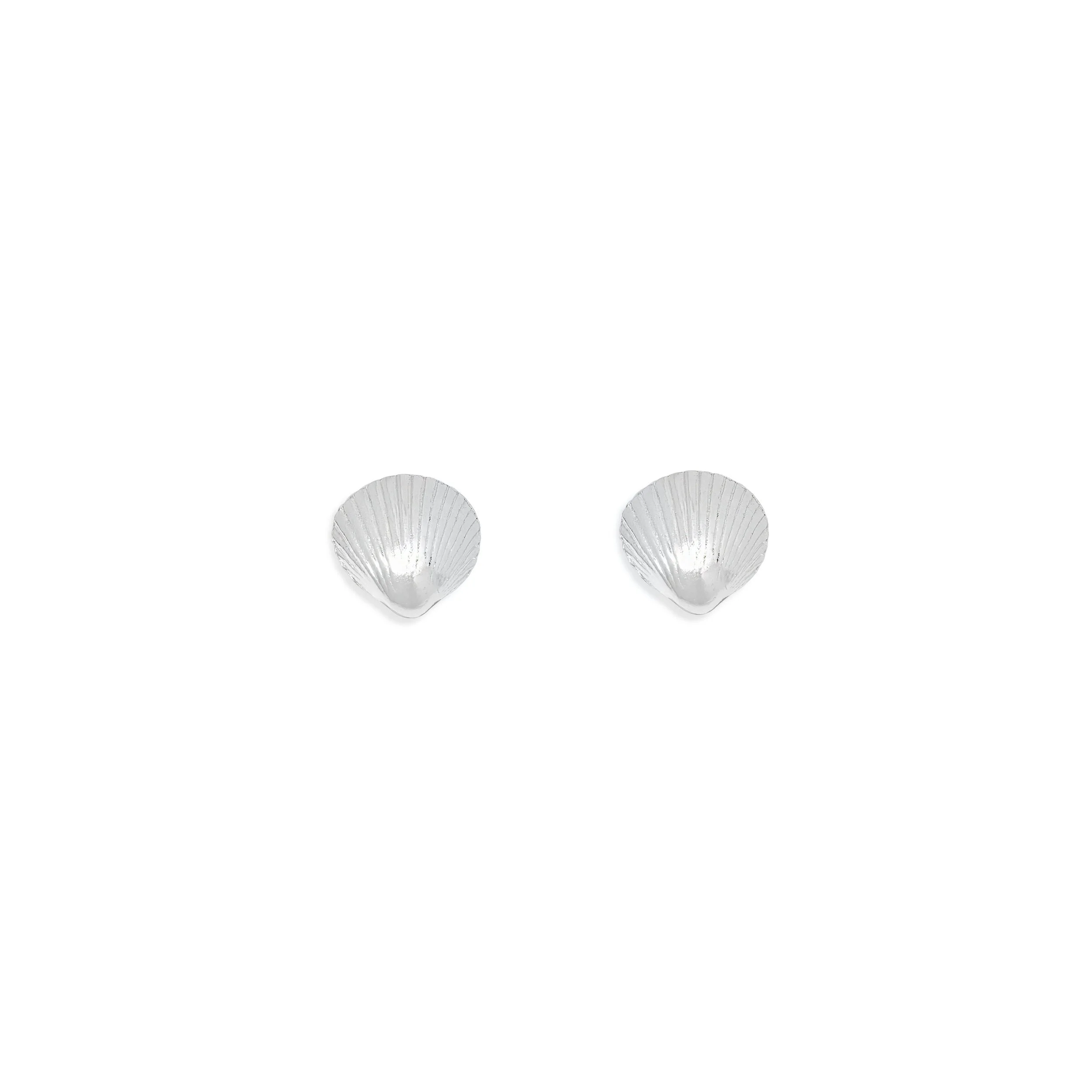 Sterling silver clamshell stud earrings with textured detailing, inspired by coastal seashells.