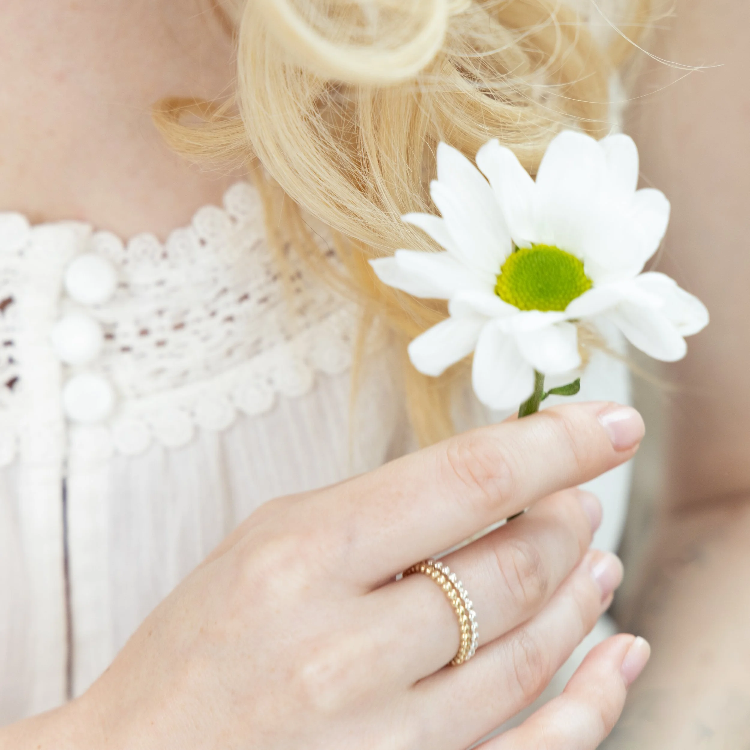 9ct yellow gold stacking ring with a delicate bobble design, featuring a polished finish and slender band for versatile wear.