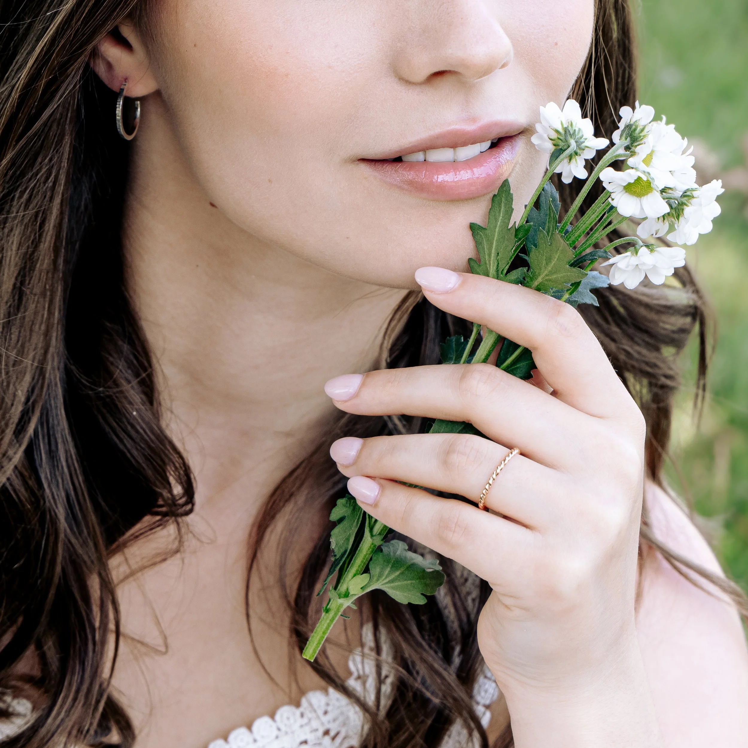 Delicate 9ct yellow gold twist stacking ring with a polished rope design, perfect for layering or wearing as a minimalist band.