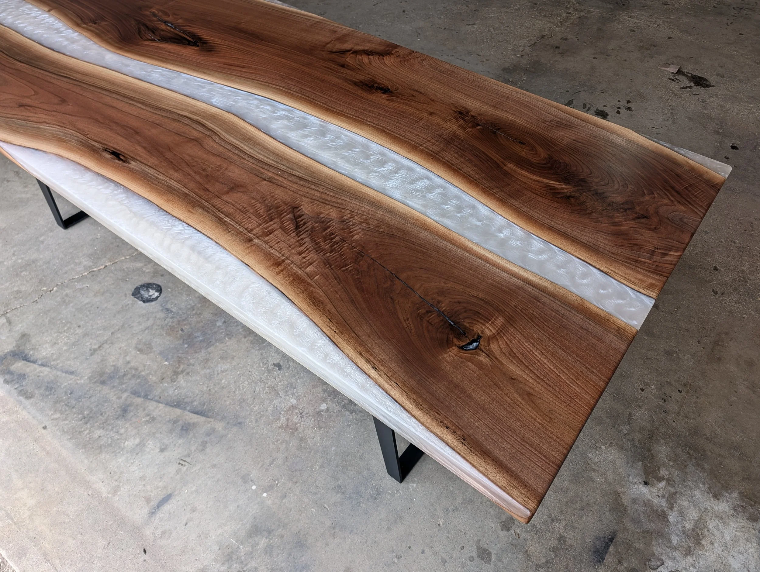 Black walnut river table with pearl epoxy