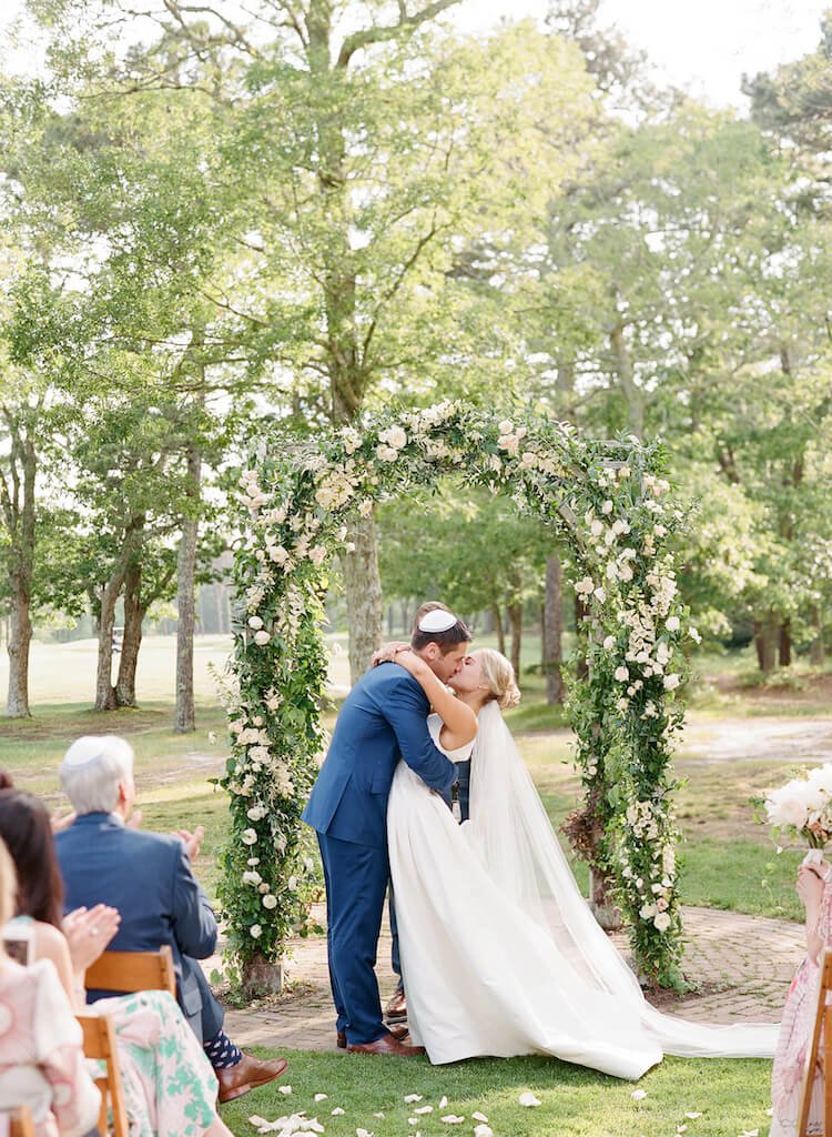 farm-neck-first-kiss-wedding-ceremony.jpeg