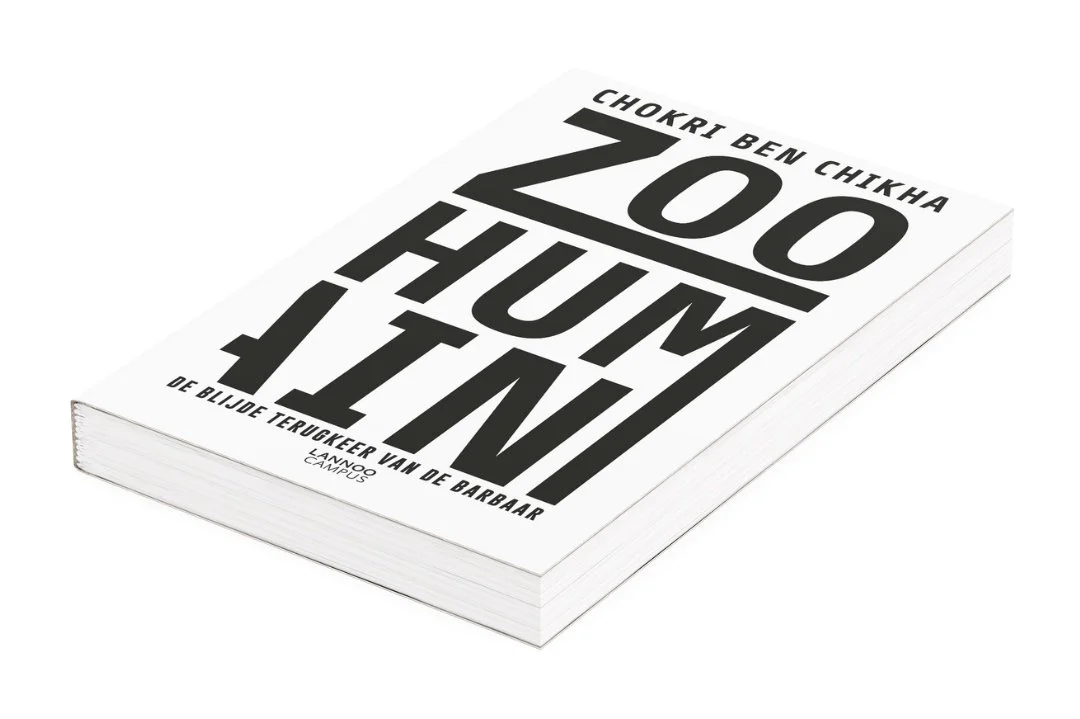 Paperback book titled 'Zoo Humain' by Chokri Ben Chikha, with a subtitle in Dutch, 'The Joyful Return of the Barbarian'.