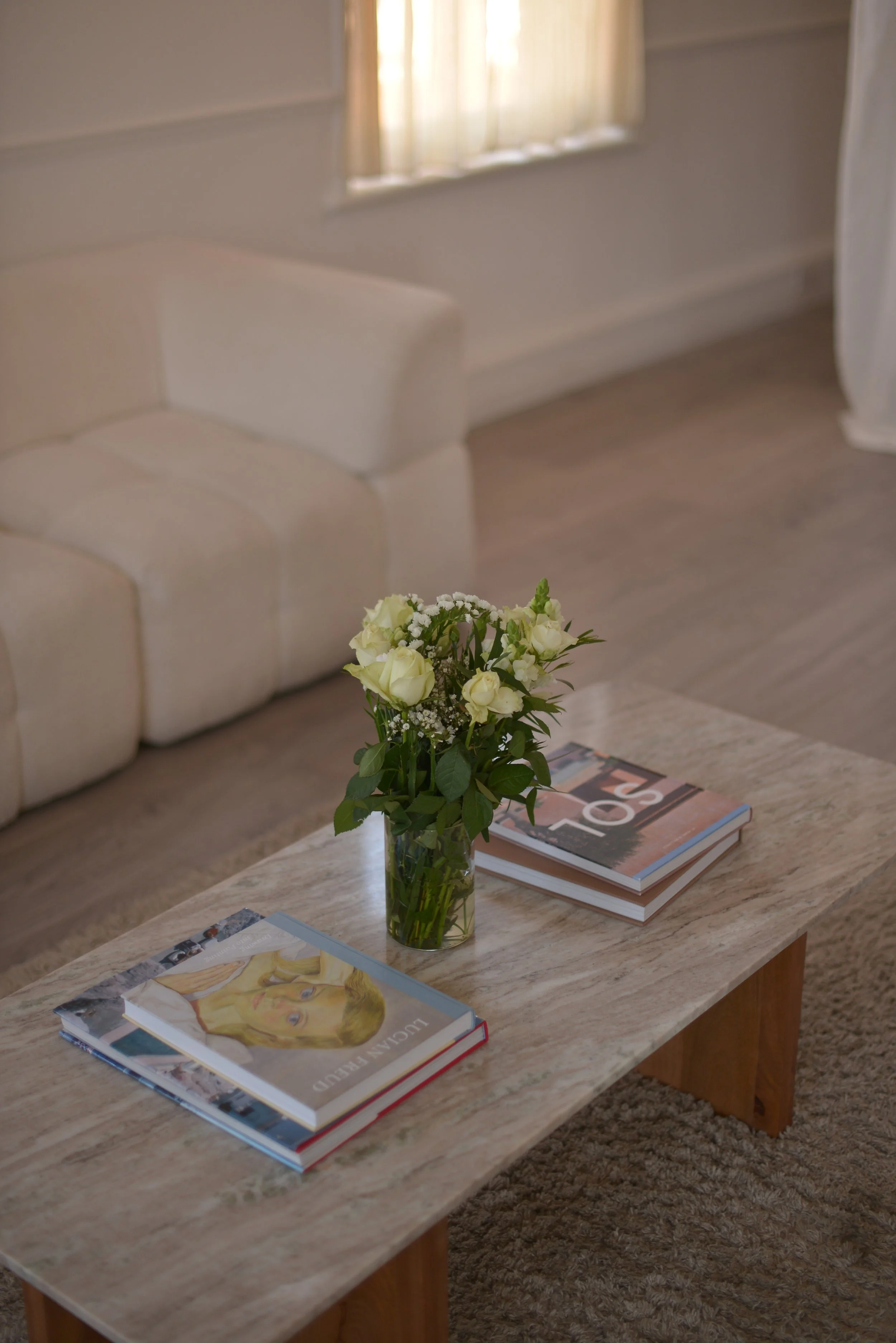 Marble coffee table and books