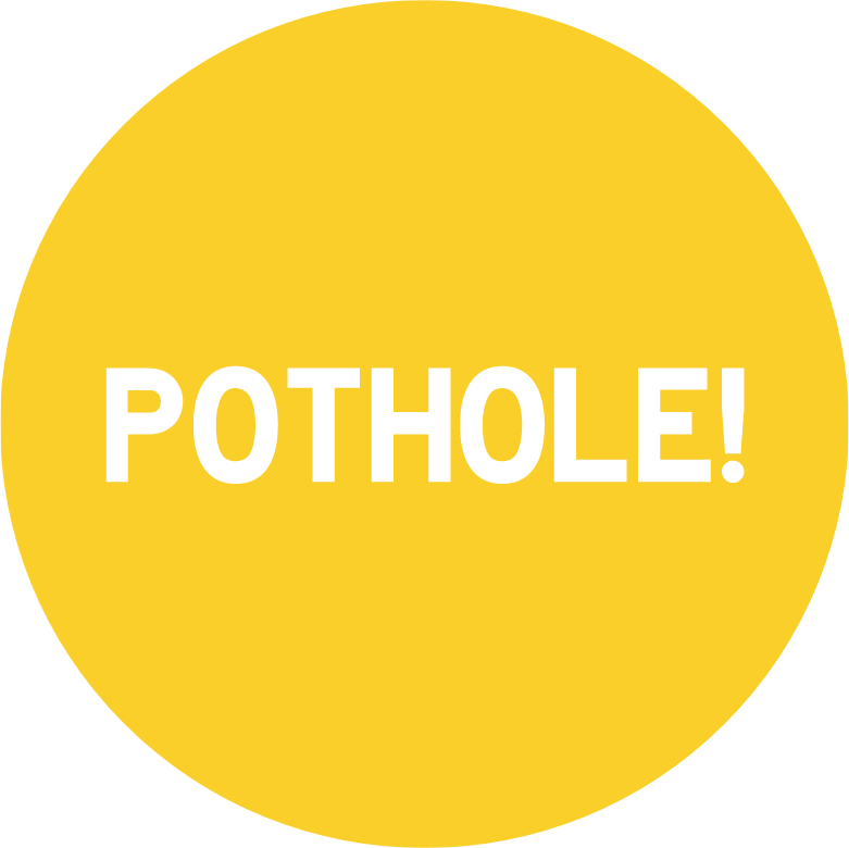 Yellow circular road sign with the word 'POTHOLE!' written in white uppercase letters.