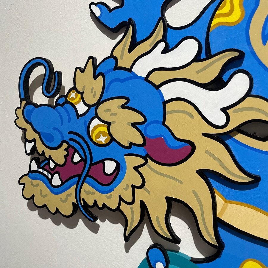 Azure Dragon by @whereisjooj 

Jojo layers multiple woodcuts to add dimension and bring this dragon to life our Year of the Dragon show.