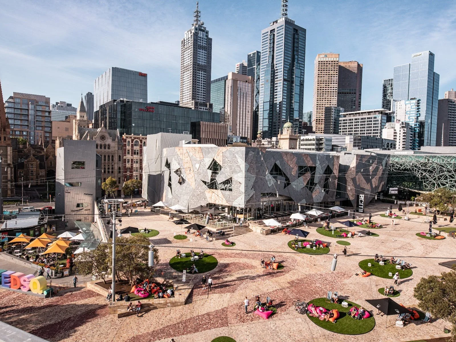Aerial view of Federation Square and the Melbourne CBD skyline