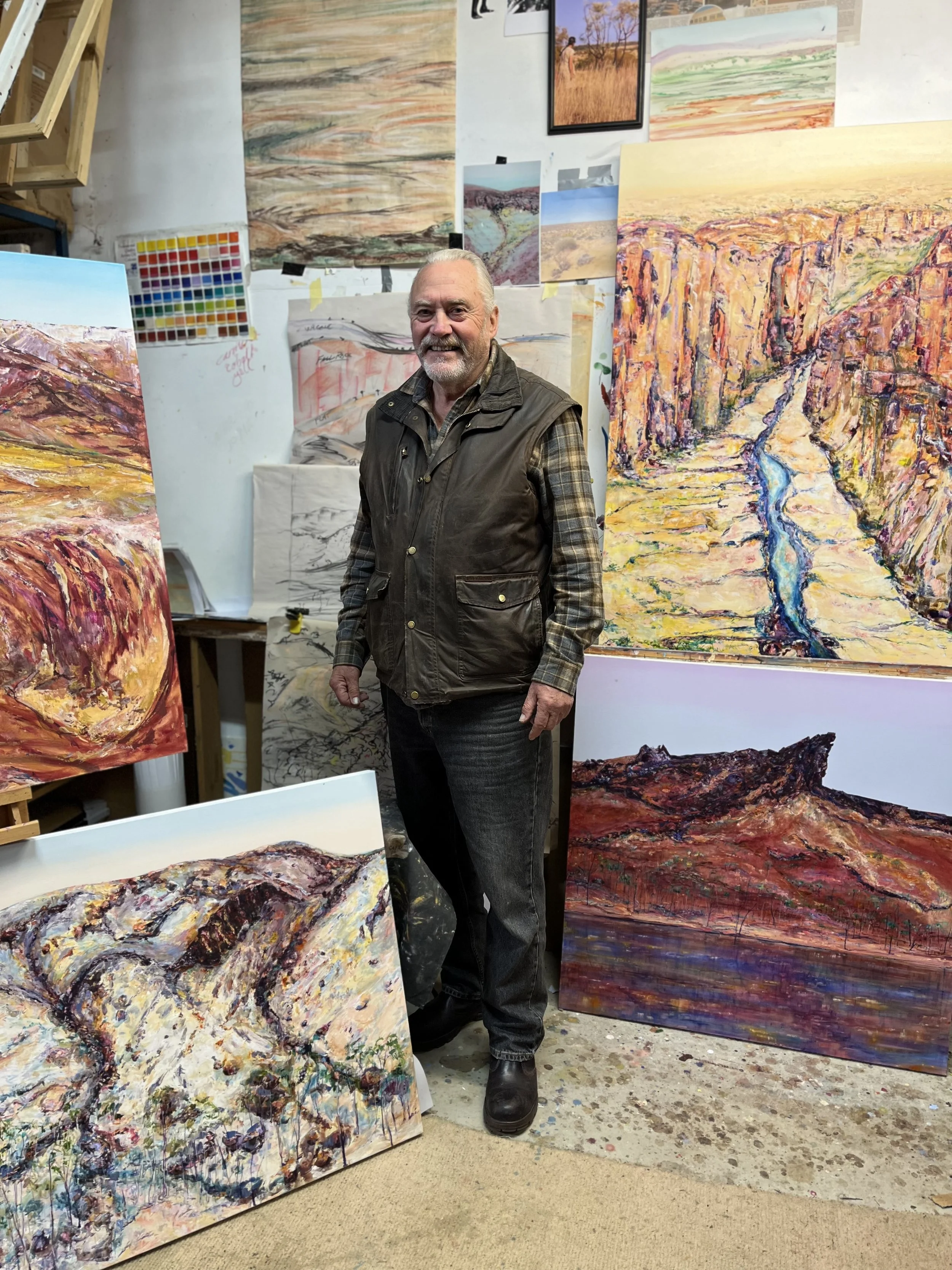 Laurence Cummin In his studio with his Outback Queensland Series 2023