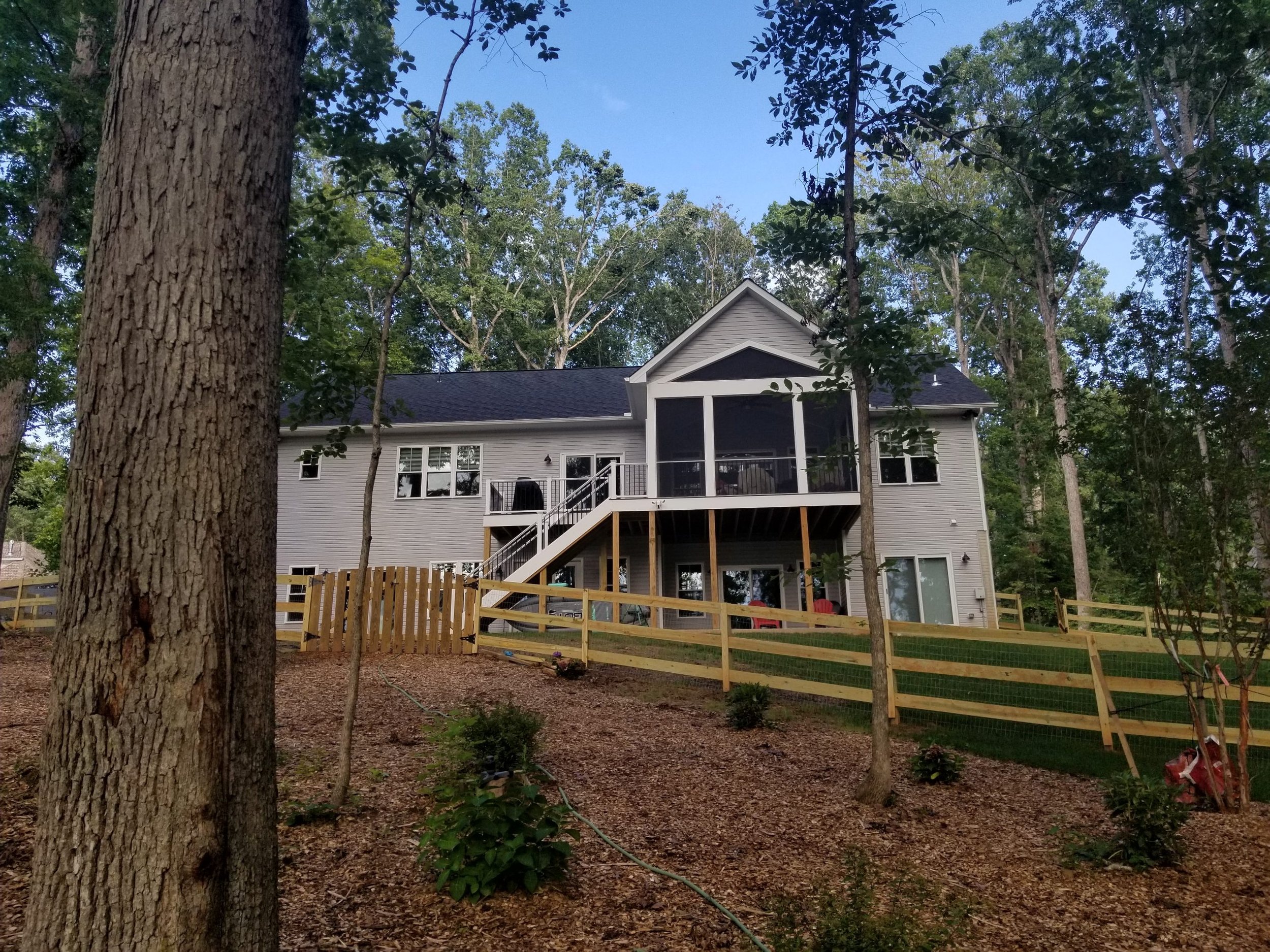 custom lake anna home from backyard.jpeg