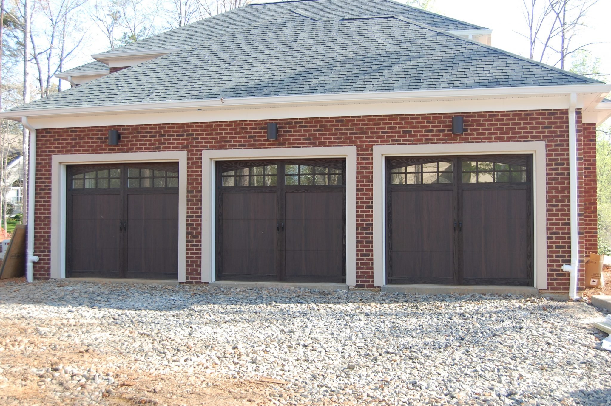 brick three car garage build fredericksburg custom homes.jpeg