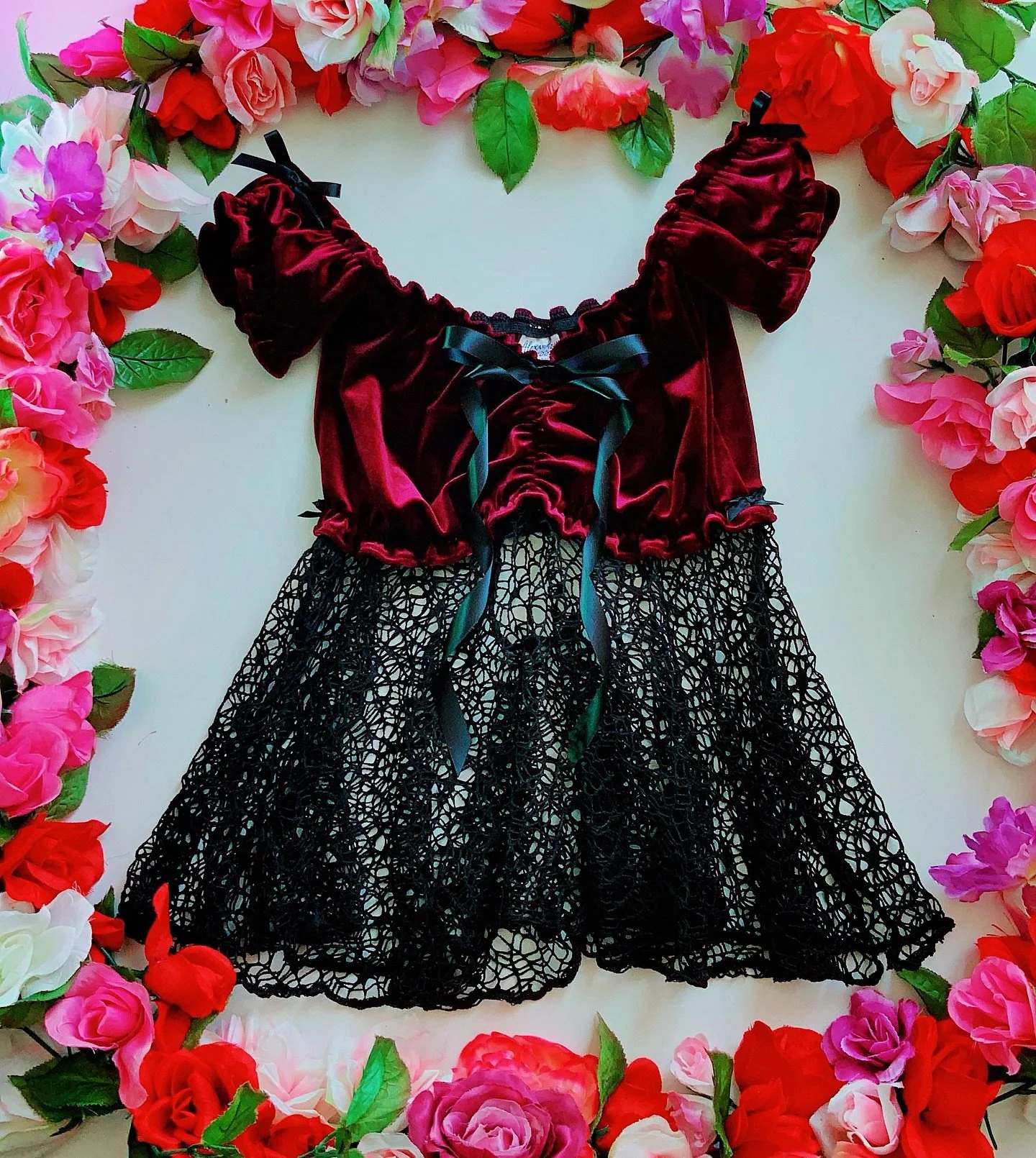 To be found and lost all at once&hellip; to wander into the unknown just to discover dreams you never imagined. 🧚🏼&zwj;♀️✨ Introducing the Liliana Babydoll 🥀 burgundy stretch velvet, webbed fishnet, and a little magic. 🕊️

Created for the souls w