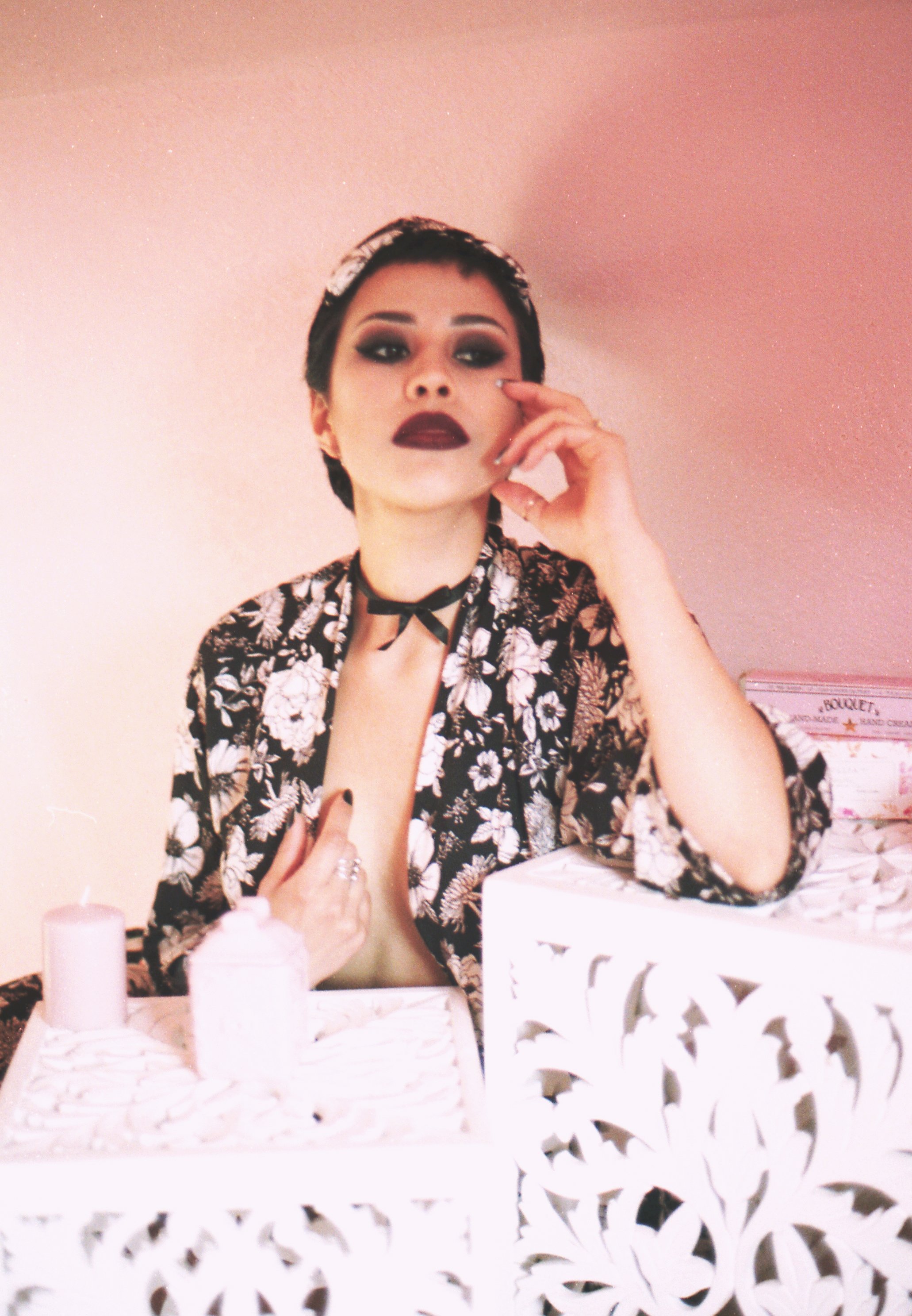 The Fawn Choker showcased on a model, paired with a floral robe. A perfect accessory to elevate your intimate and daytime looks.