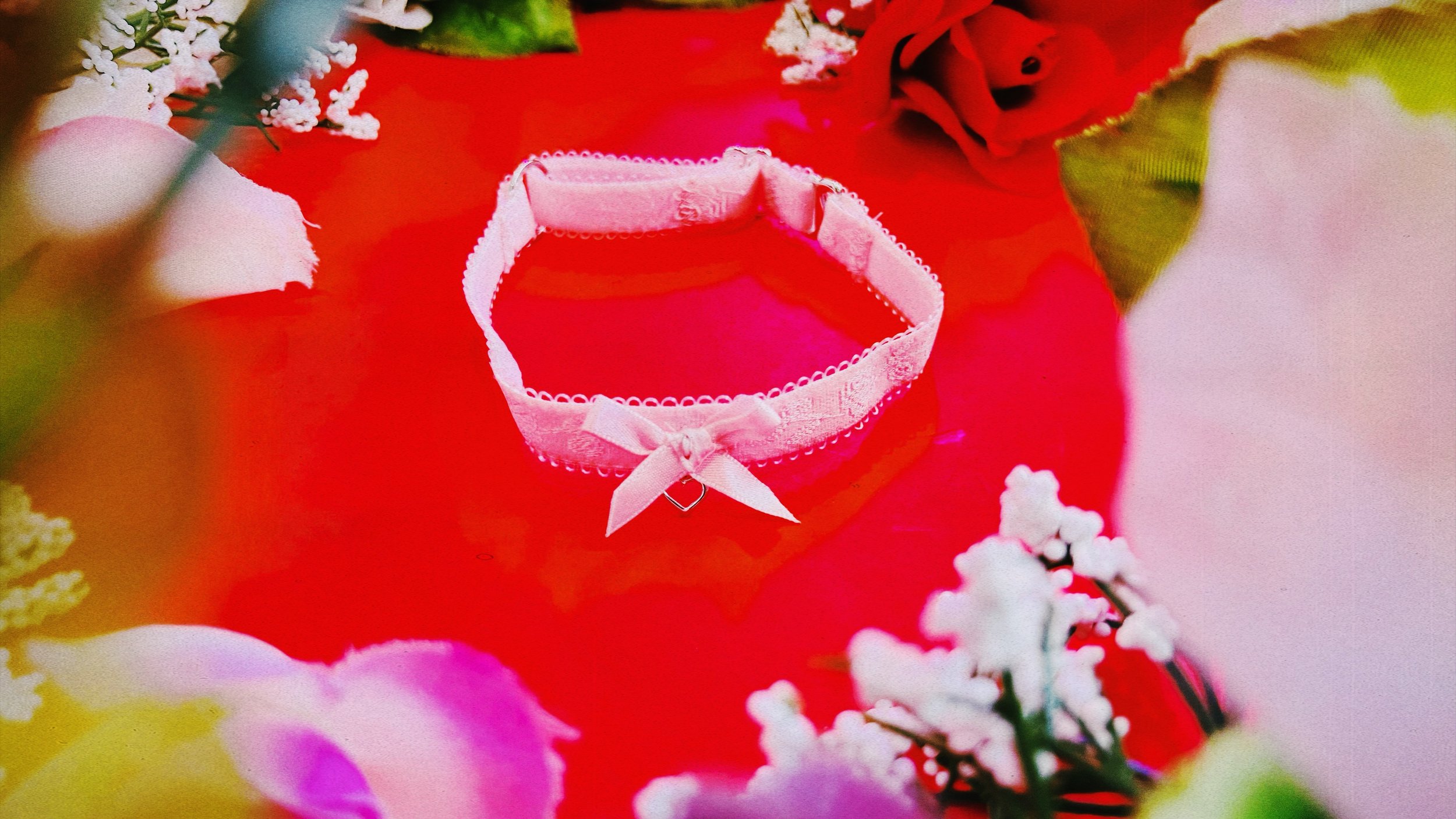 The Fawn Choker styled amidst soft floral accents with ethereal lighting, making it a versatile piece for any occasion.