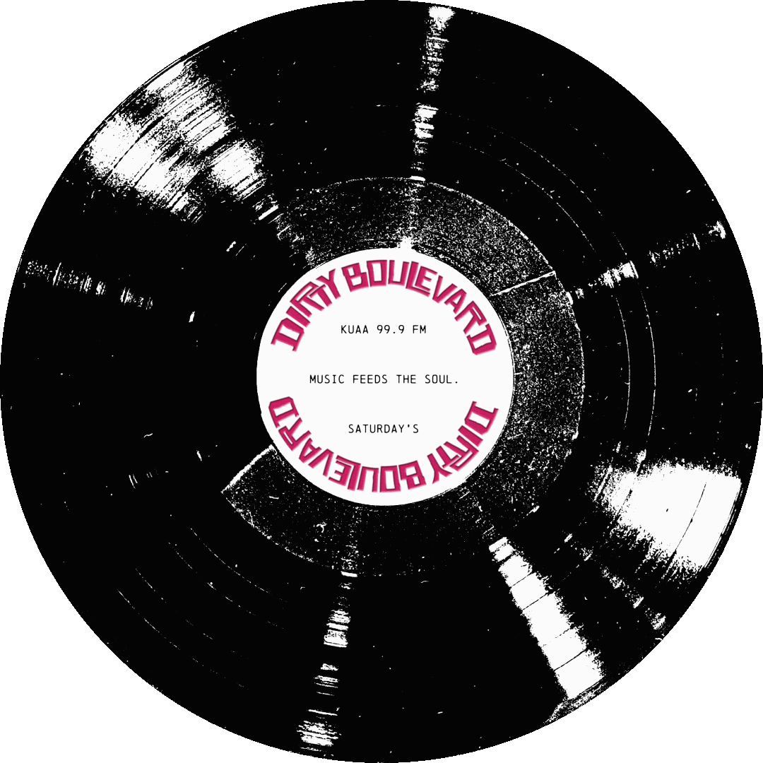 Black vinyl record with a white label that reads "Dirty Boulevard KUAA 99.9 FM MUSIC FEEDS THE SOUL. SATURDAY'S" in pink text.
