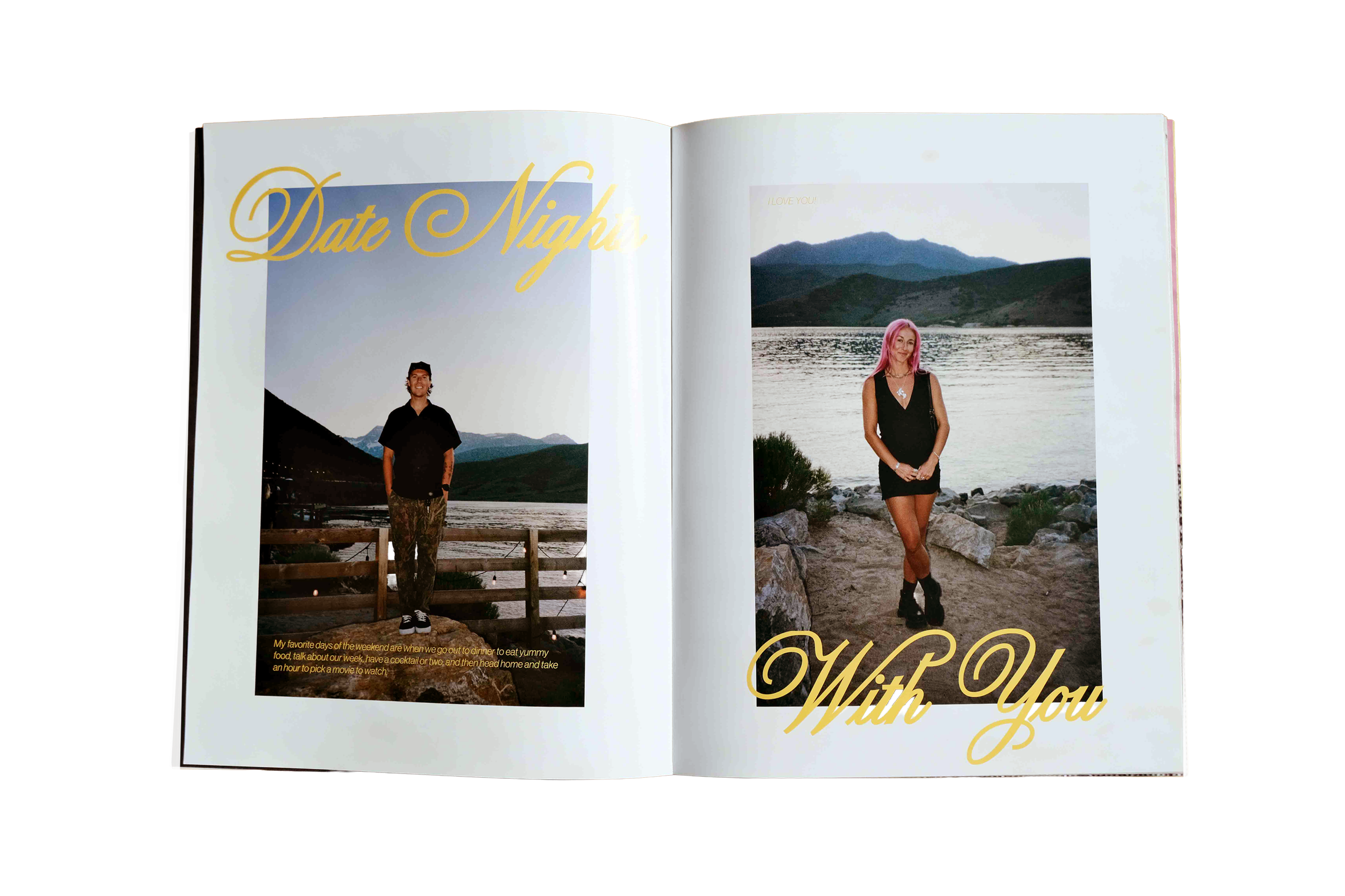 Open magazine showing two pages of a photo spread. The left page features a man standing outdoors near a body of water, with mountains in the background, under the heading 'Date Night' written in large yellow script. The right page shows a woman with pink hair standing by a lake at sunset, with mountains in the background, and the text 'With You' in large speech bubble style font.