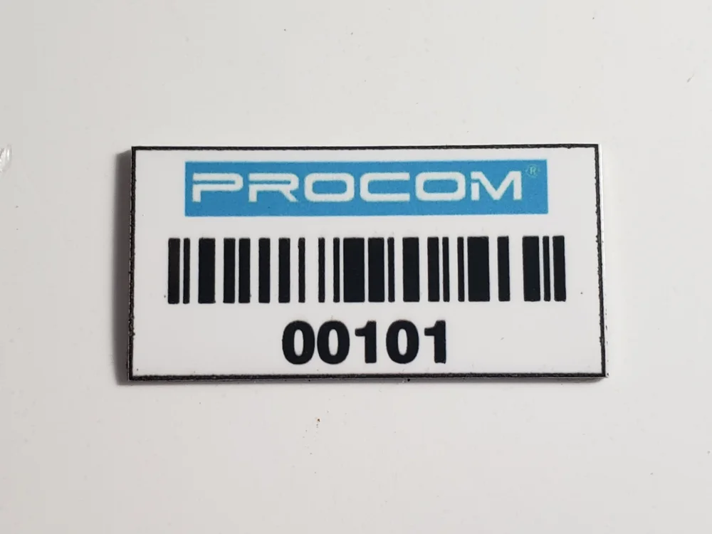 Placa de aluminio con identidad de Procom