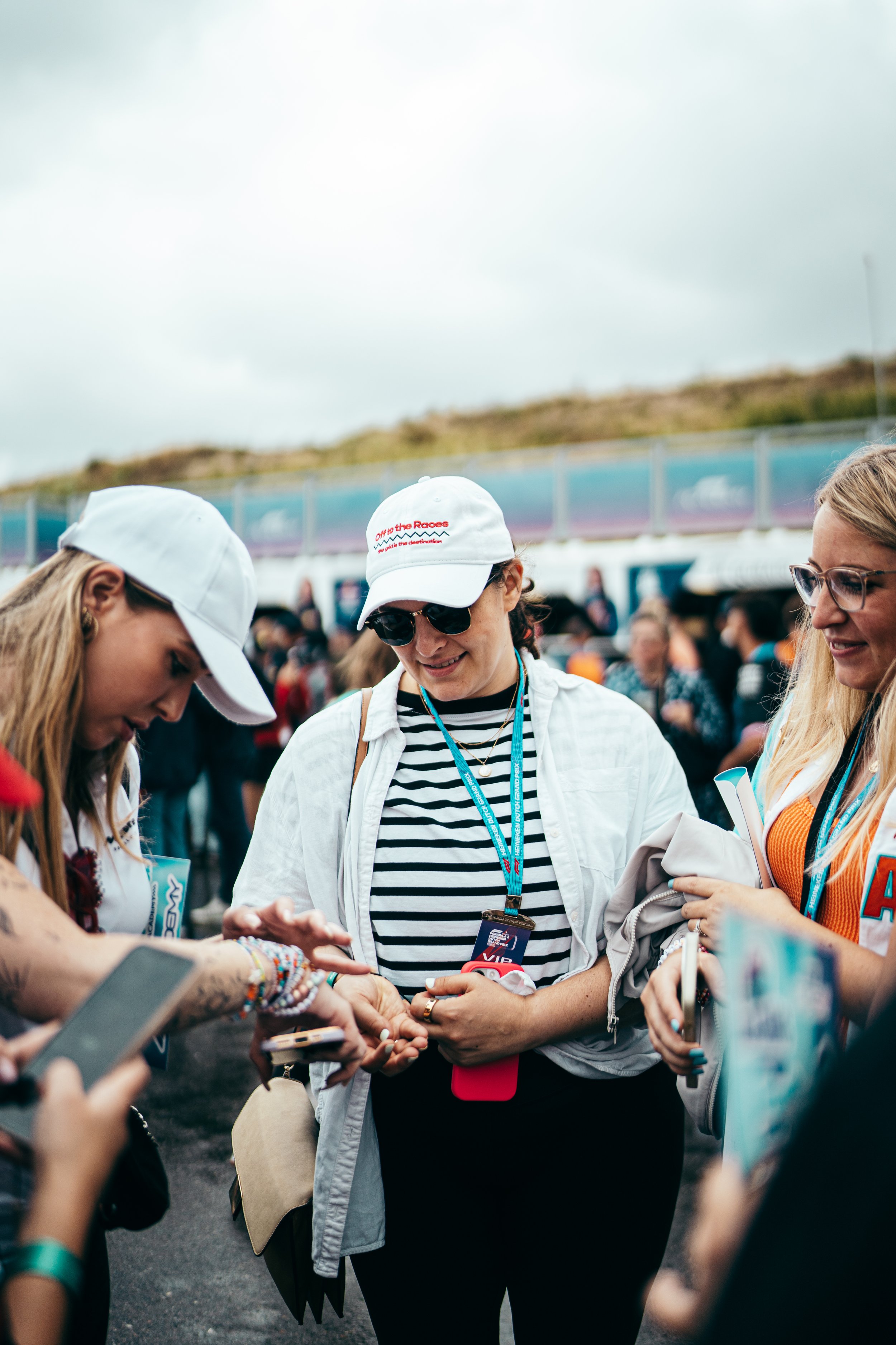 OTTR guests laughing together during a Formula 1 race weekend