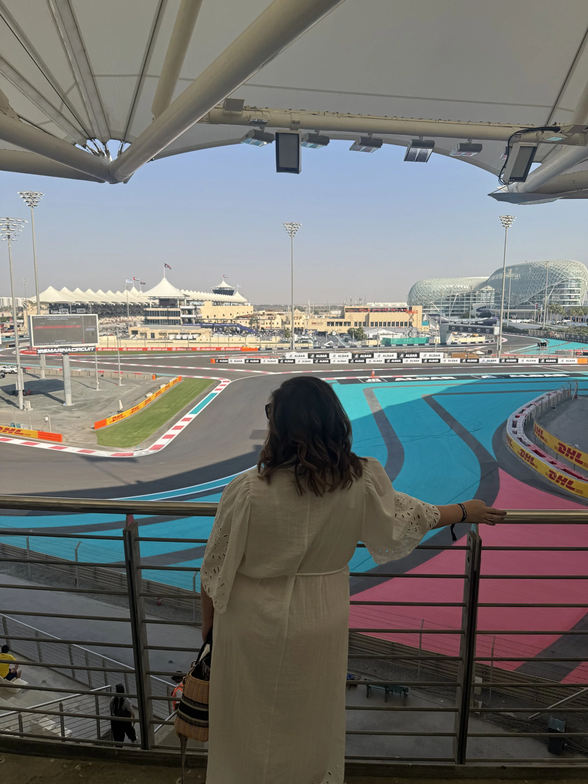 Sunset over the Yas Marina Circuit in Abu Dhabi during a luxury Formula 1 Grand Prix weekend with OTTR