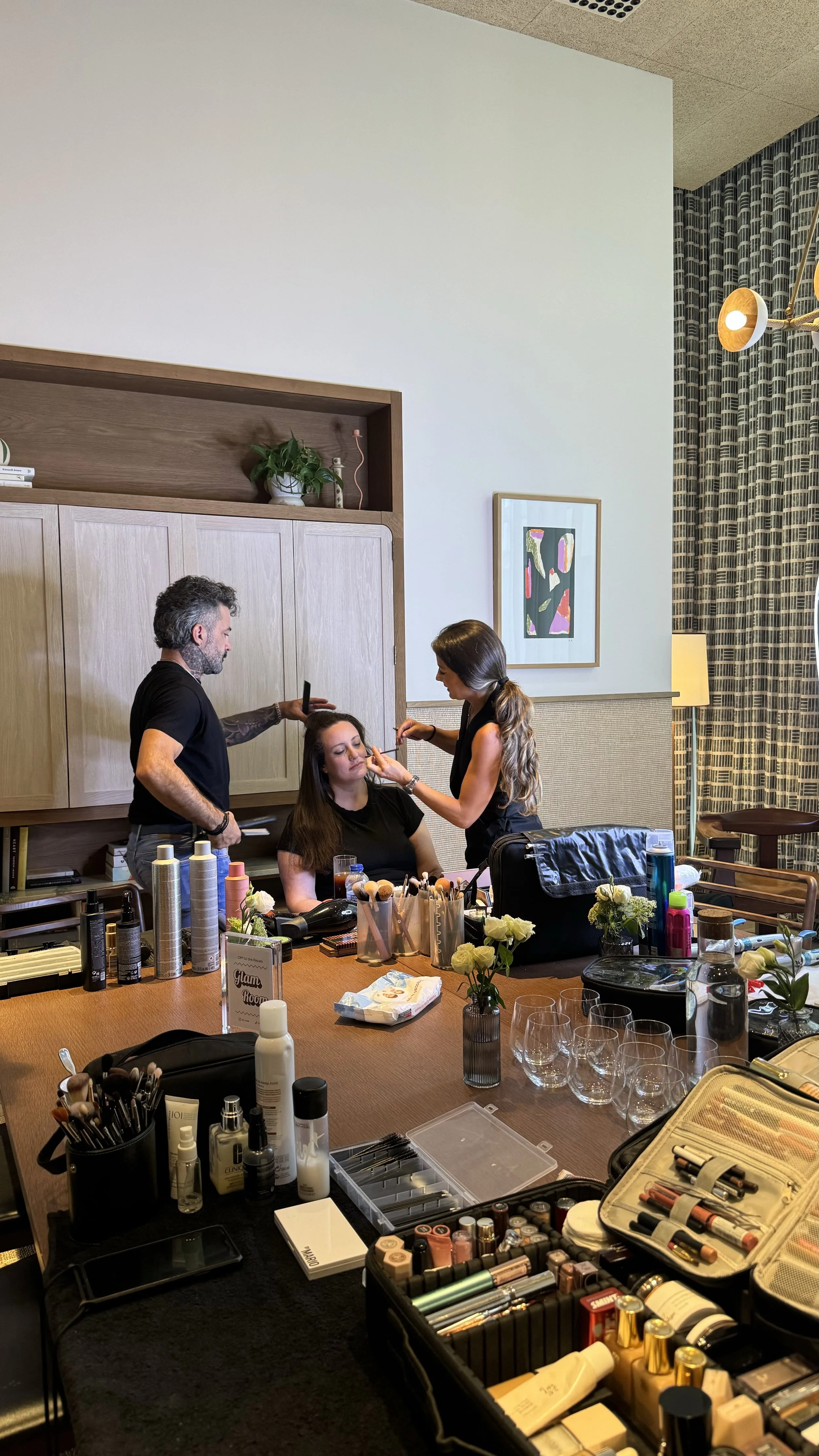 OTTR guests getting ready together in the race day glam room