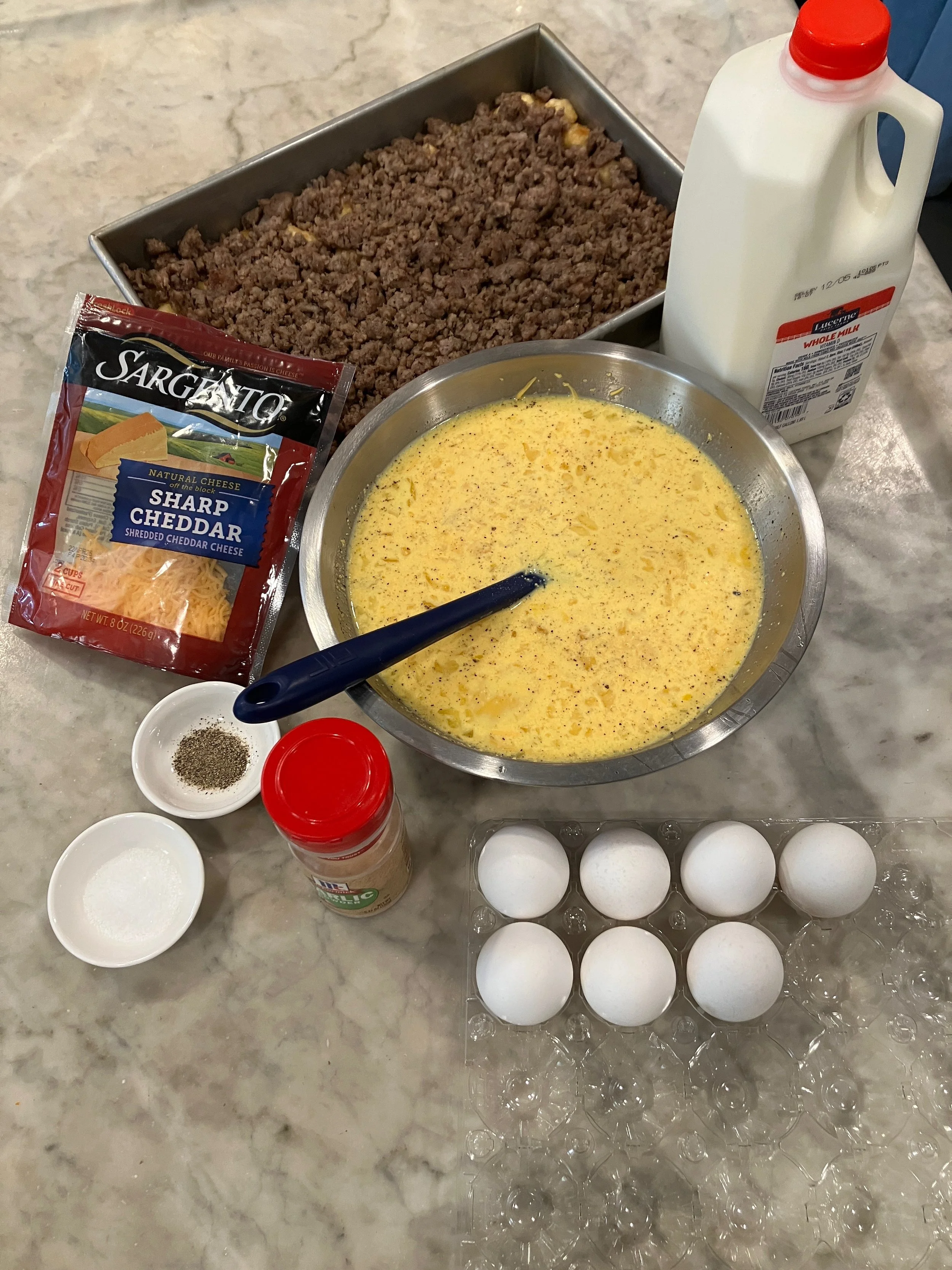 Display of ingredients for White Swan Tavern's Sausage, leek and hash brown breakfast casserole