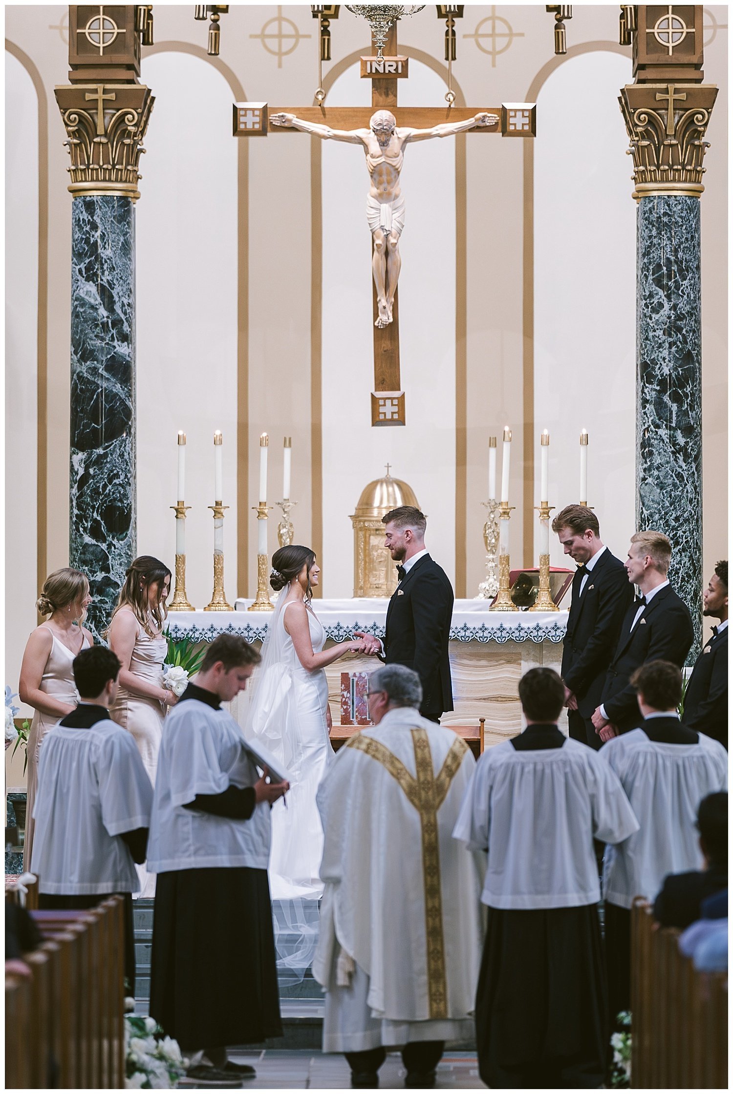 A wedding couple during their wedding at St. Michael's Church in Worthington. 