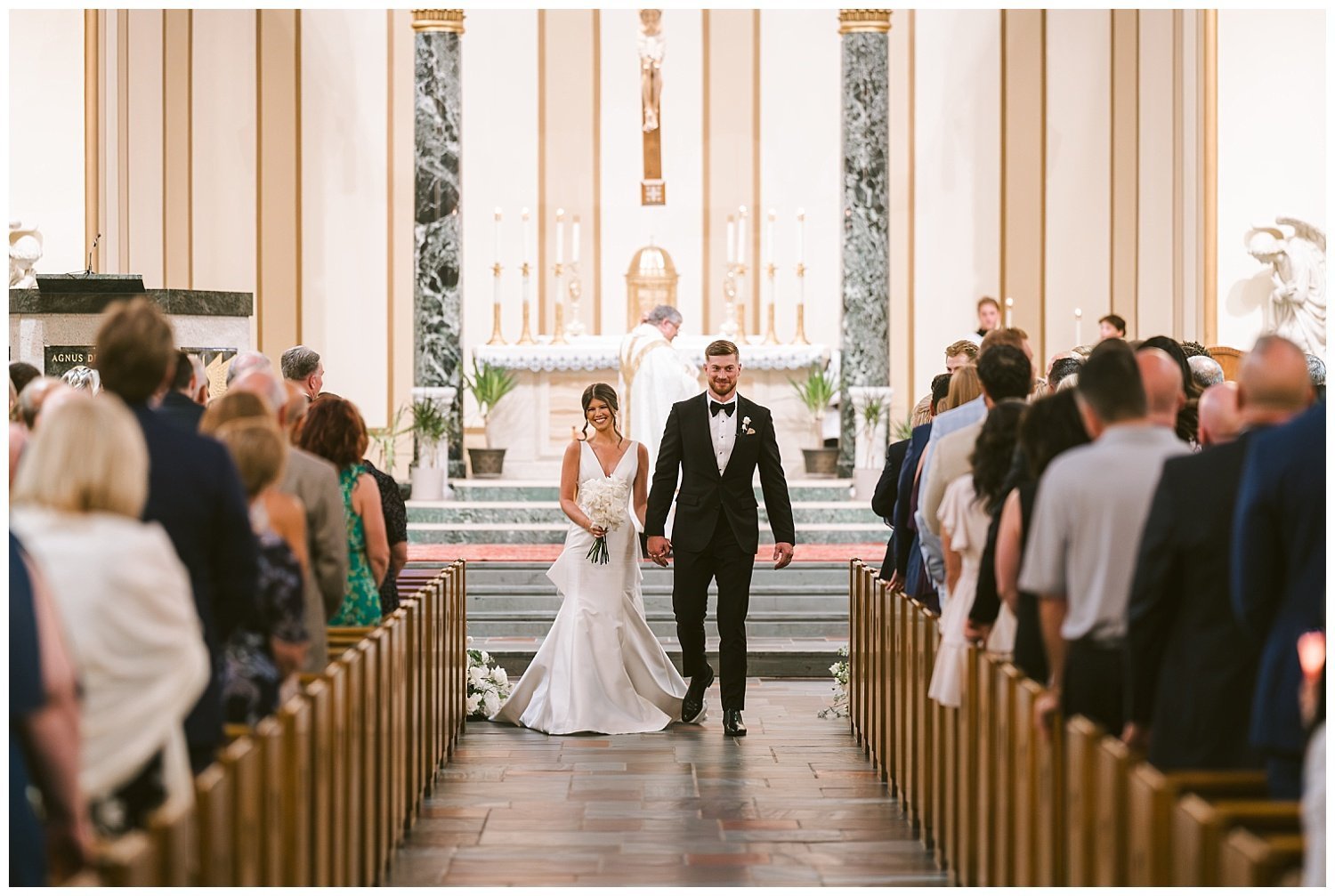 A wedding couple during their wedding at St. Michael's Church in Worthington. 
