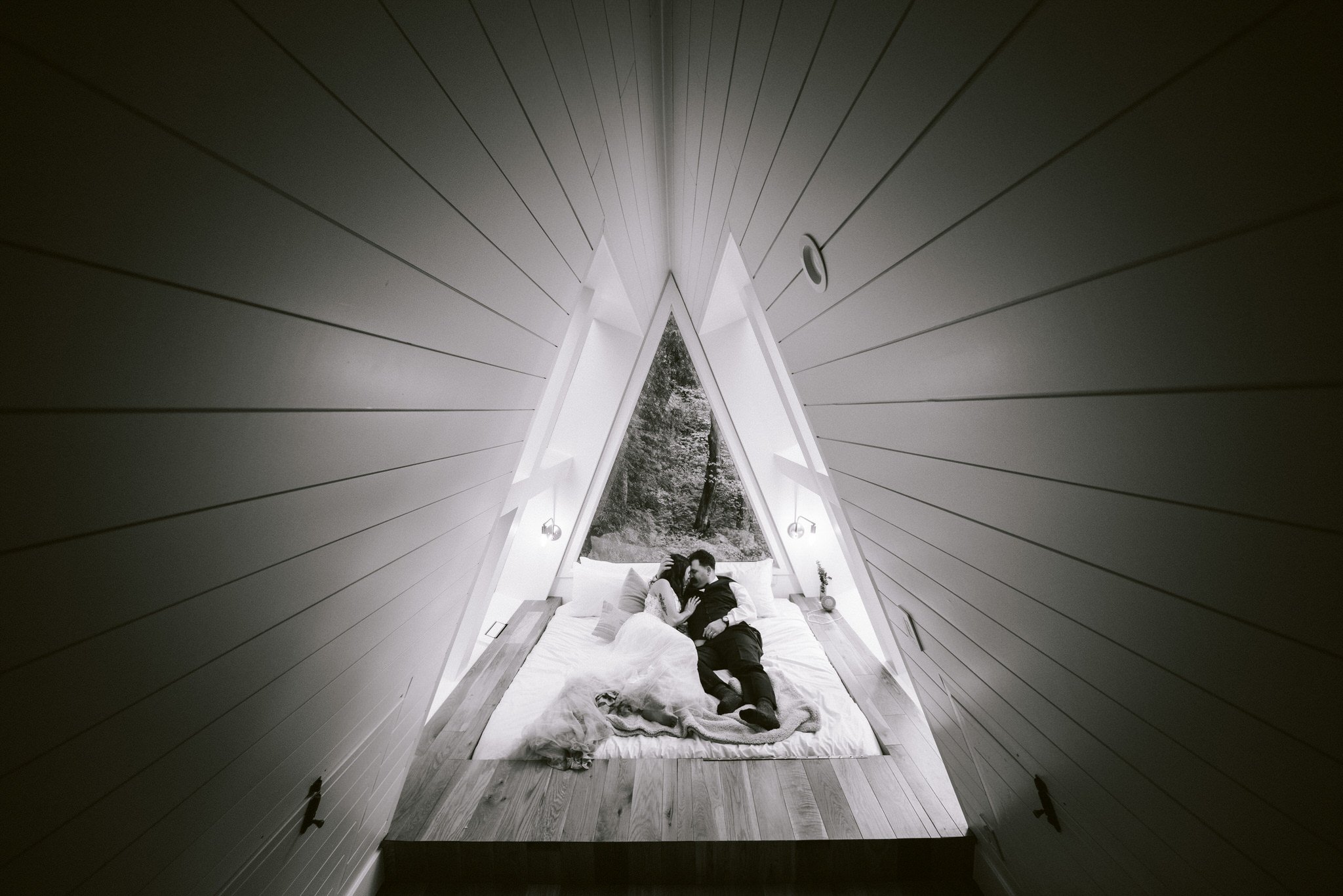 A bride and groom sharing an intimate moment on their wedding day.