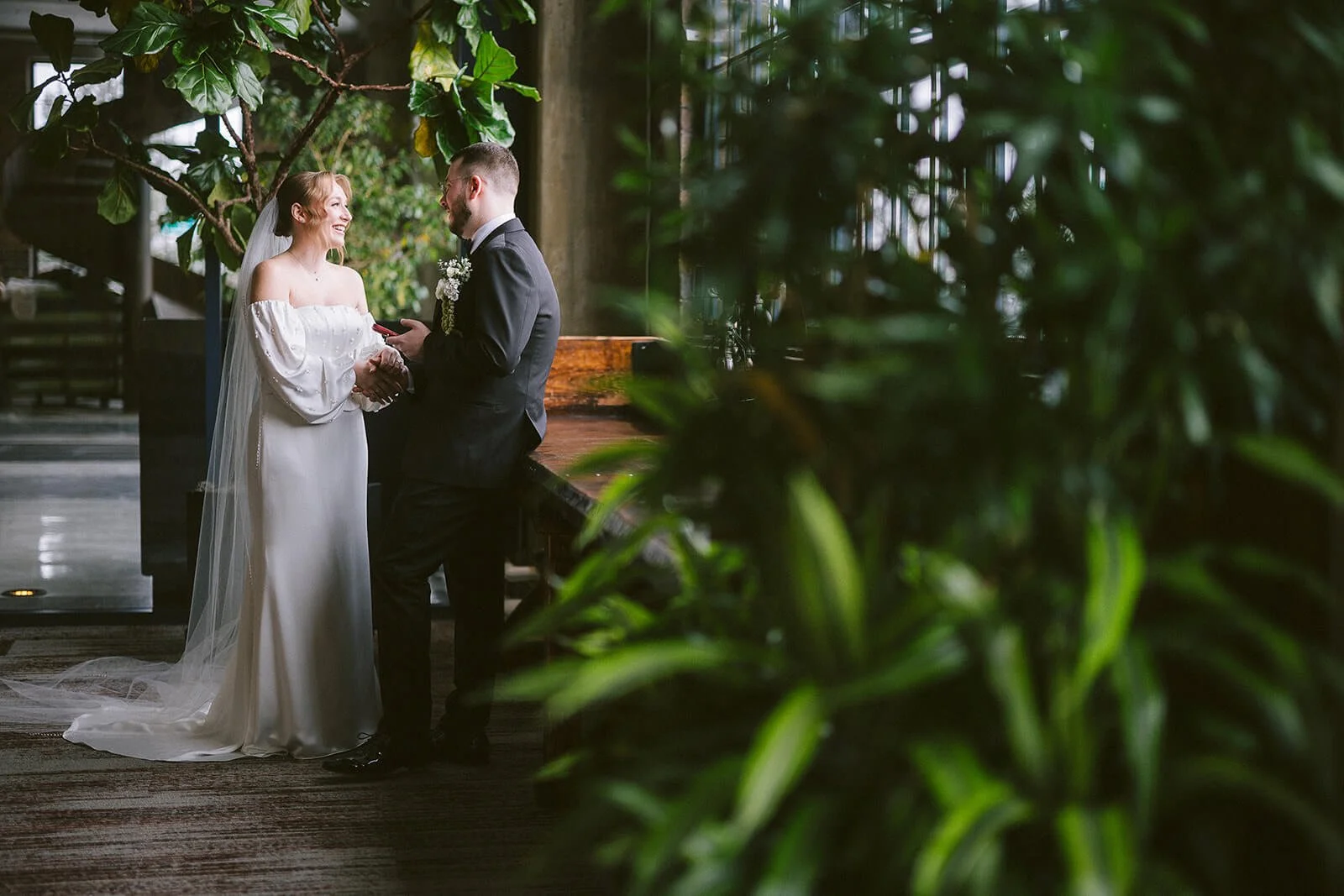 A bride and groom sharing private vows on their wedding day.