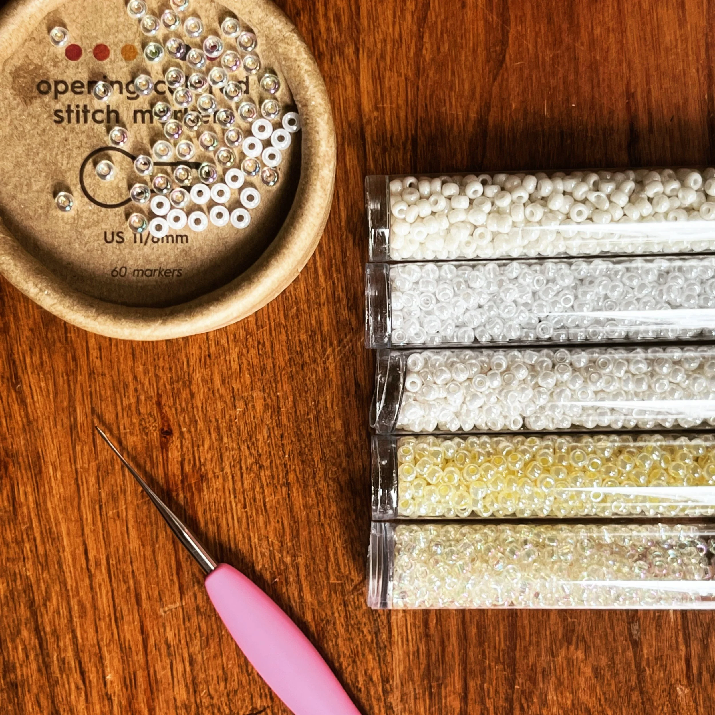 Bead time. I used Miyuki 8/0 seed beads in six different hues and opacities (five of them shown here - I wasn't sure about the sixth at first, and made the call to add it in towards the end!): translucent peony, opaque limestone luster, crystal ivory