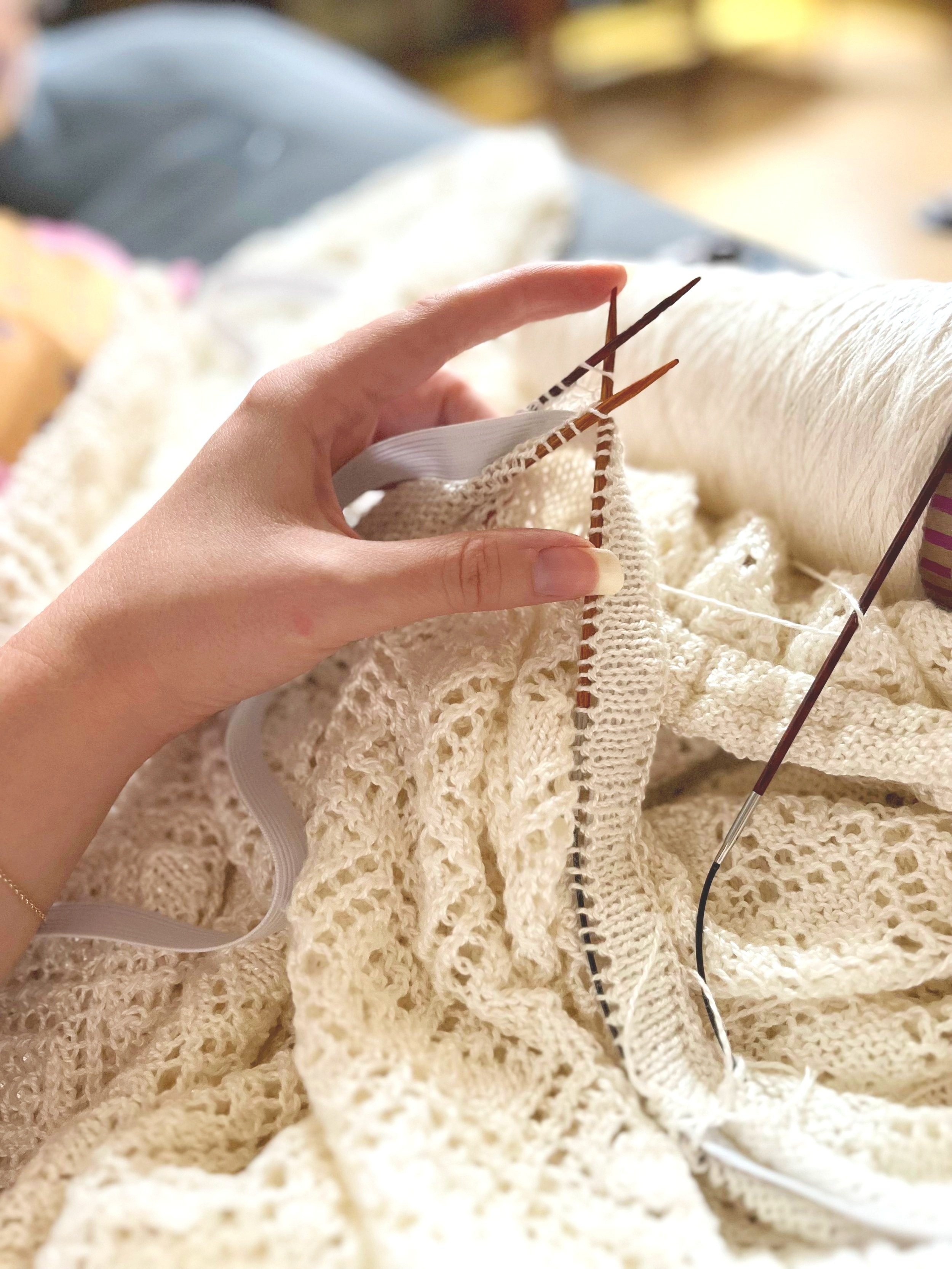 Having finished the skirt, enclosing a strip of elastic into a waistband knit up from the provisionally cast-on stitches.
