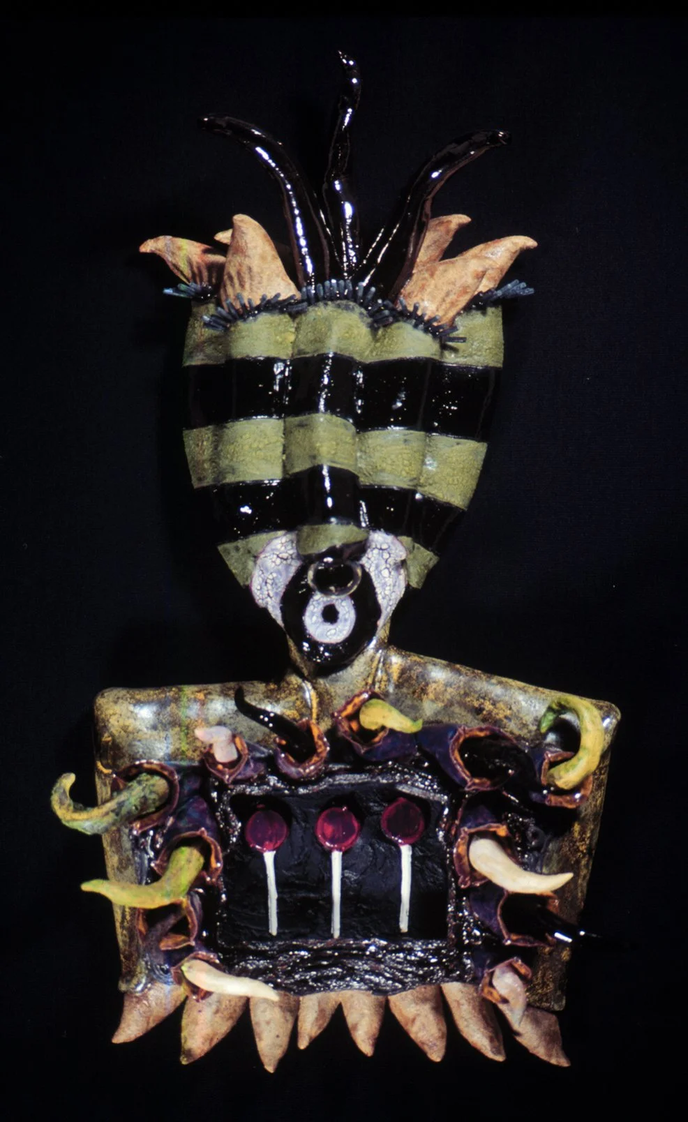 3's A Charm, 28" x 17" x 6", clay, multifired glaze and underglaze, slip cast suckers, metal ring.  2000