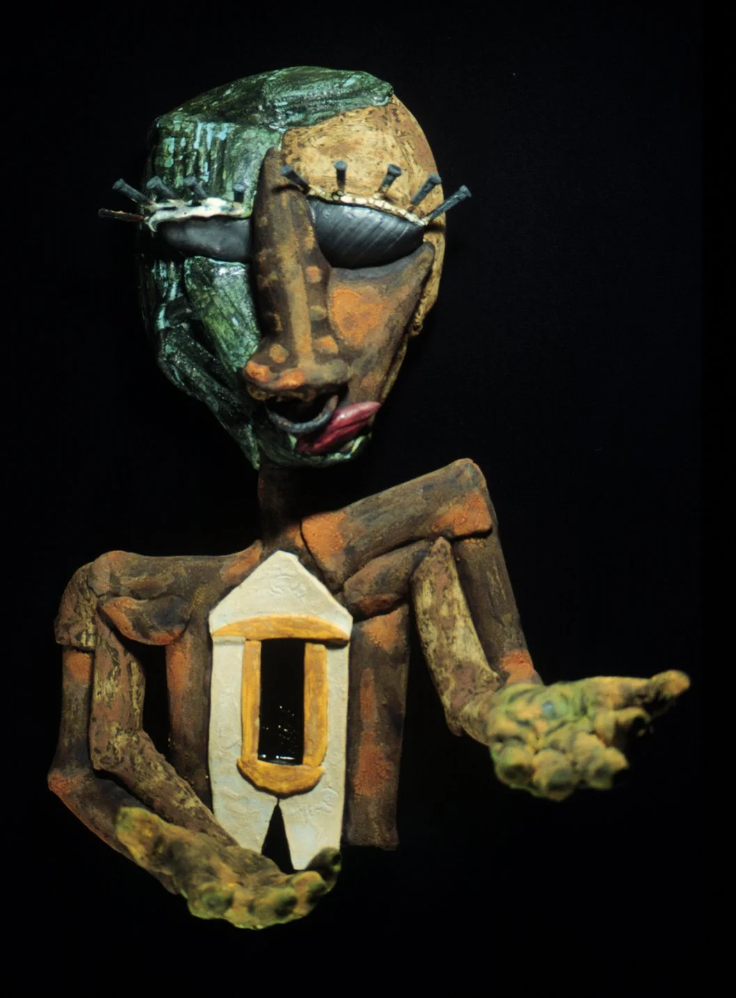 Remus,Weary, clay , multifired glaze and underglaze, nails, metal ring