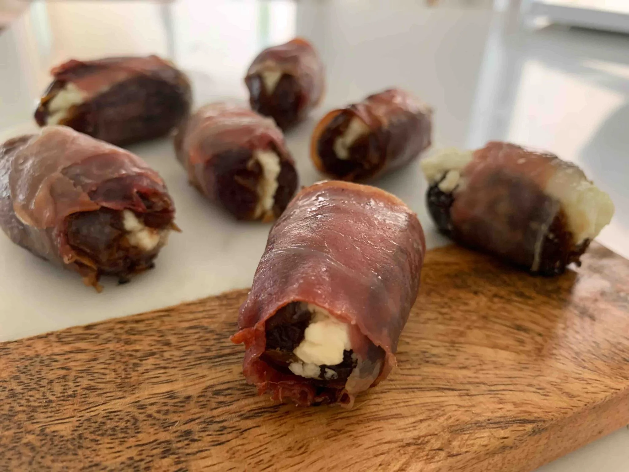 IMG_9260-prosciutto-wrapped-dates-stuffed-with-goat-cheese-2048x1536 (1).webp