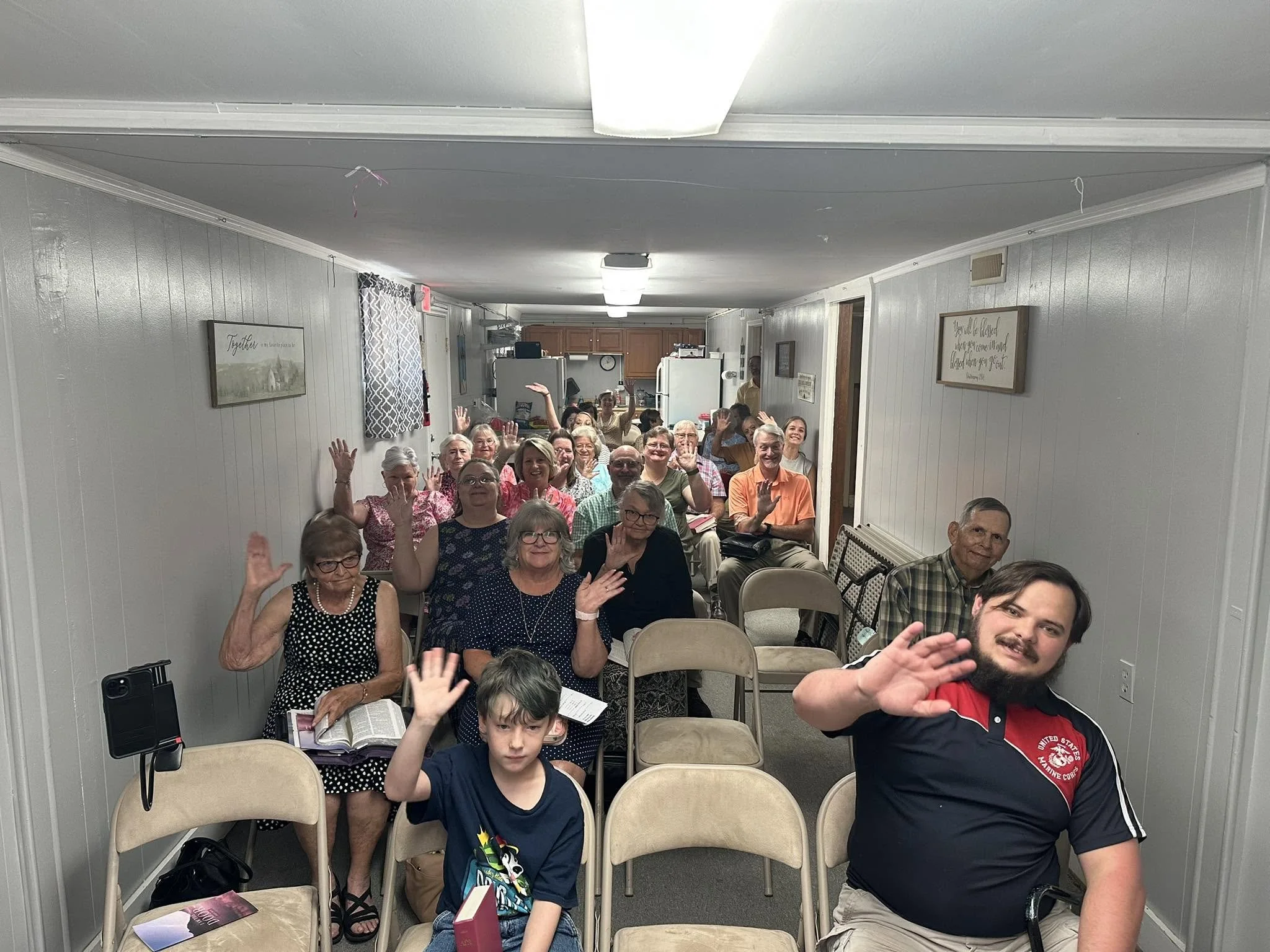 Church family having service in church basement.