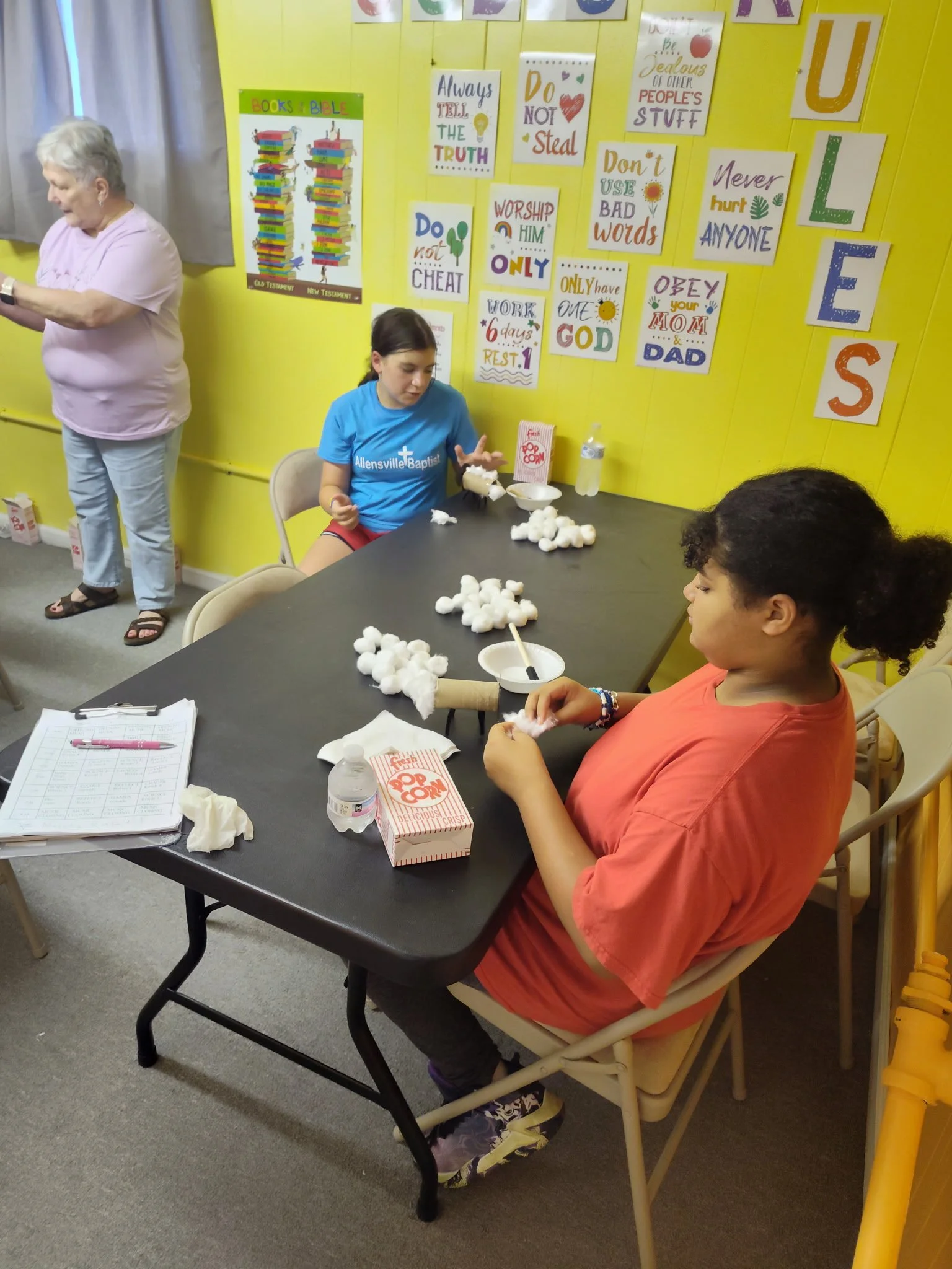 Youth crafts during Vacation Bible School.
