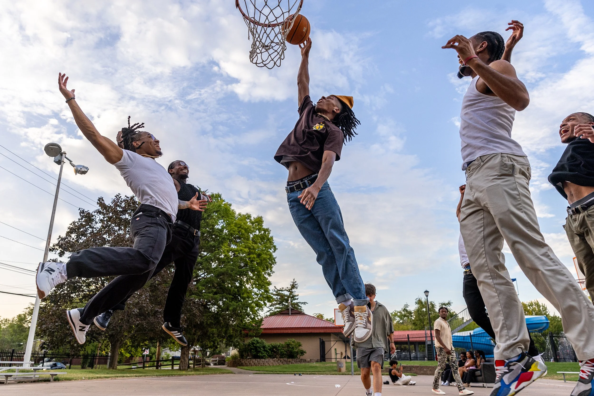 University of Missouri students work on a multi-media project titled "Black Boy Joy" at the basketball court of Douglass Park on Sept. 4, 2023, in Columbia, Mo.