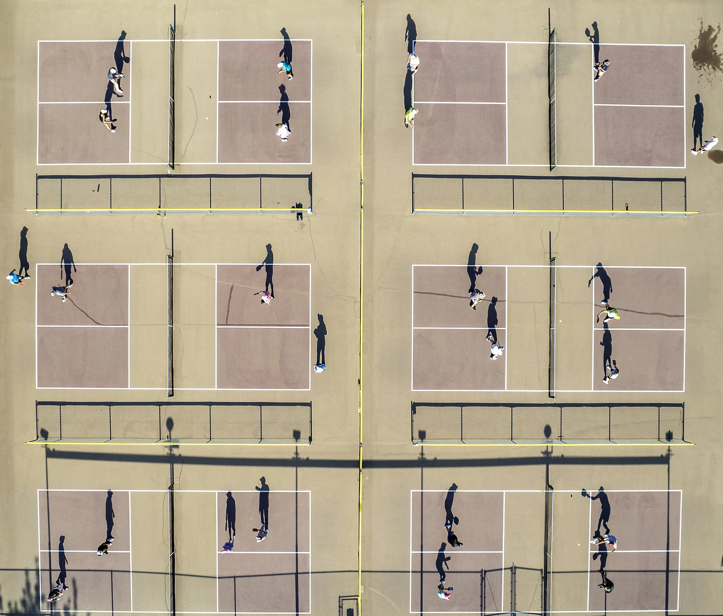 The LC Valley Pickleball Club Inc. play some friendly pick-up games on the pickleball courts of Sunset Park on June 28, 2022, in Lewiston, Idaho.