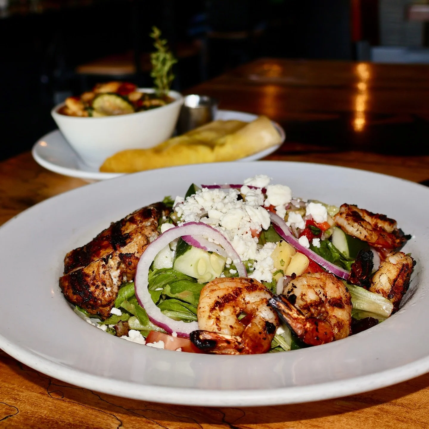 Here for a good time, not a long time, so grab these specials before they’re gone!
•Curry Goat Roti – $14
•Curry Chicken Roti – $14
•Vegetable Roti – $13
🥗 Tropical Greek Salad – mixed greens, tomatoes,