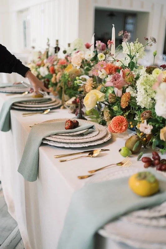 Candlelit reception tablescape with autumn florals