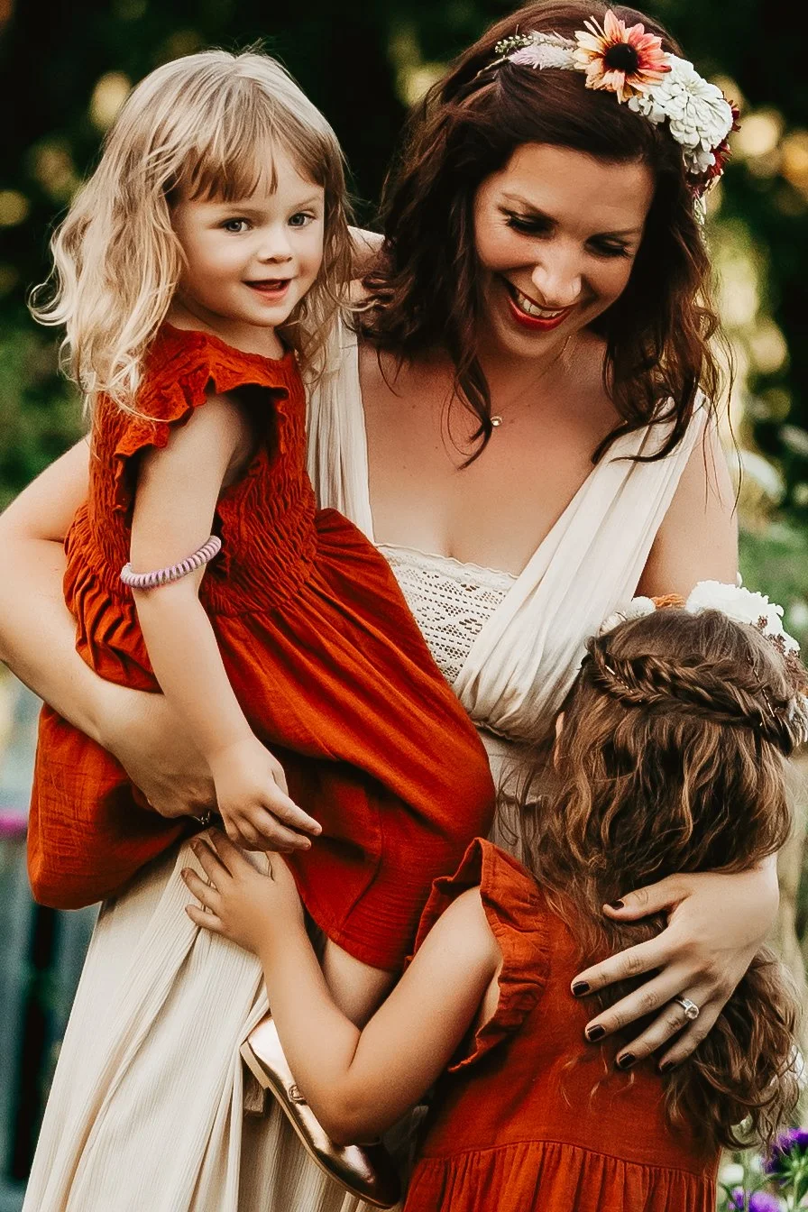 A mother and child among the blooms at Wild Ones Flower Farm
