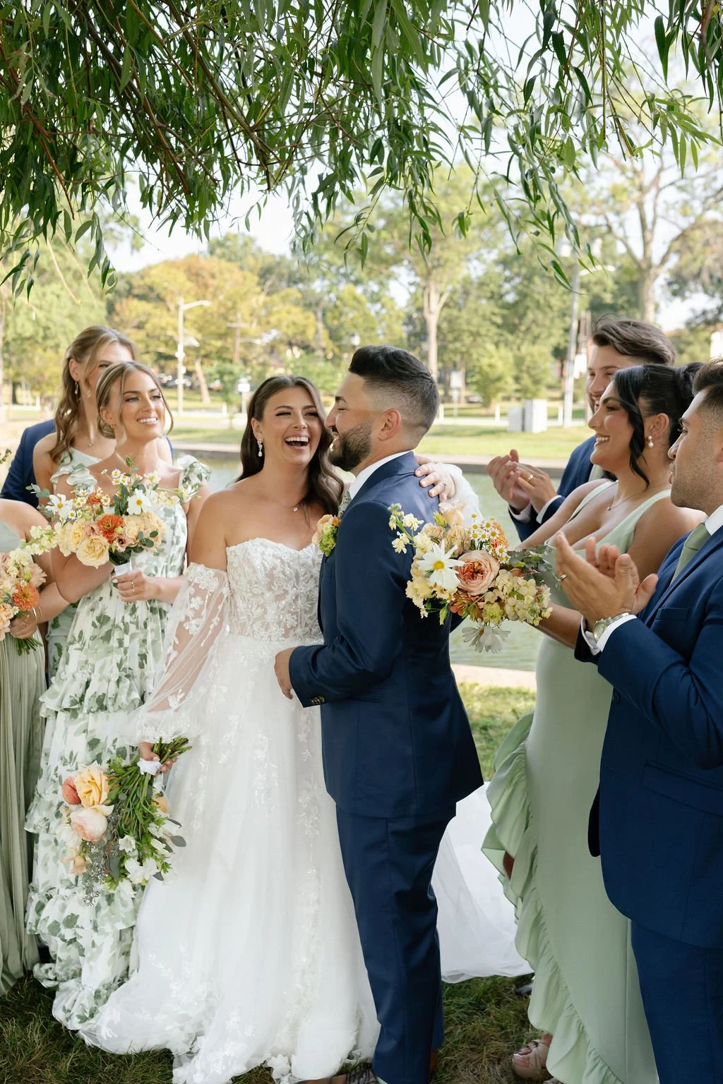 Joyful ceremony moment surrounded by the wedding party