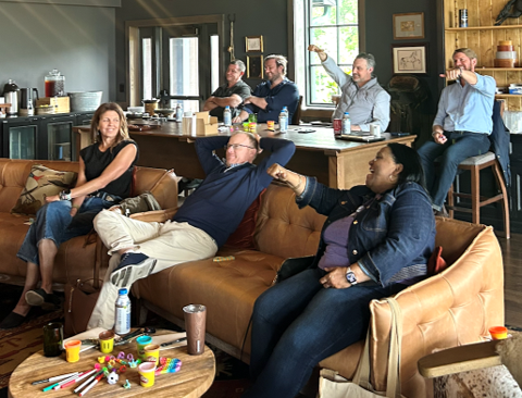 Hotel leaders collaborating during an executive priorities session