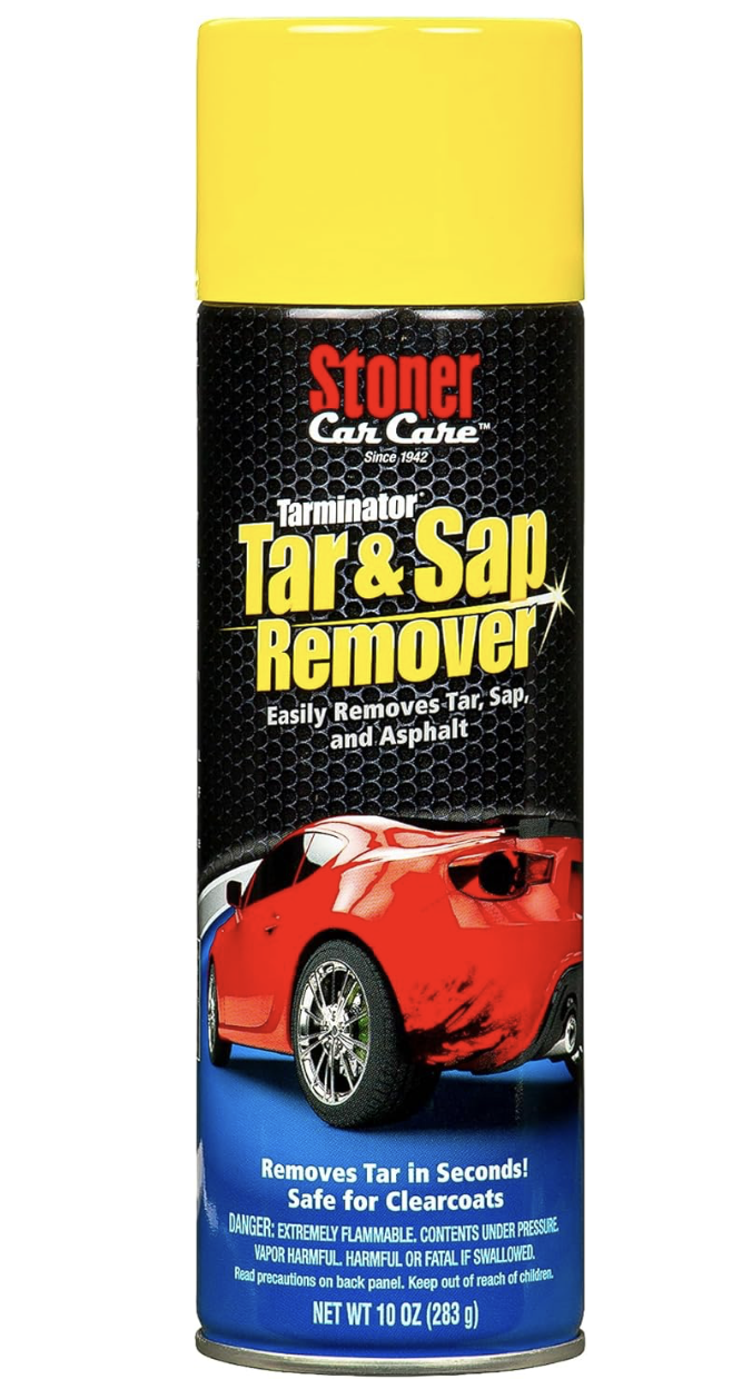 A can of Stoner Car Care Tar & Sap Remover with a yellow cap and an image of a red sports car on the label.