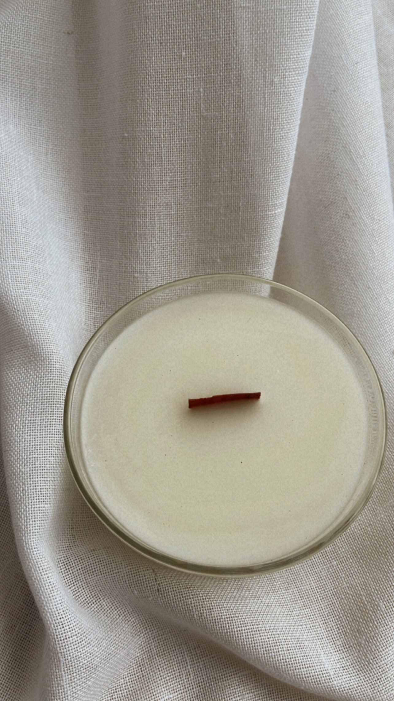 100% ivory beeswax hand poured into a gorgeous vintage crystal glass dish bowl around a wooden crackling wick, giving off the coziest ambiance.
