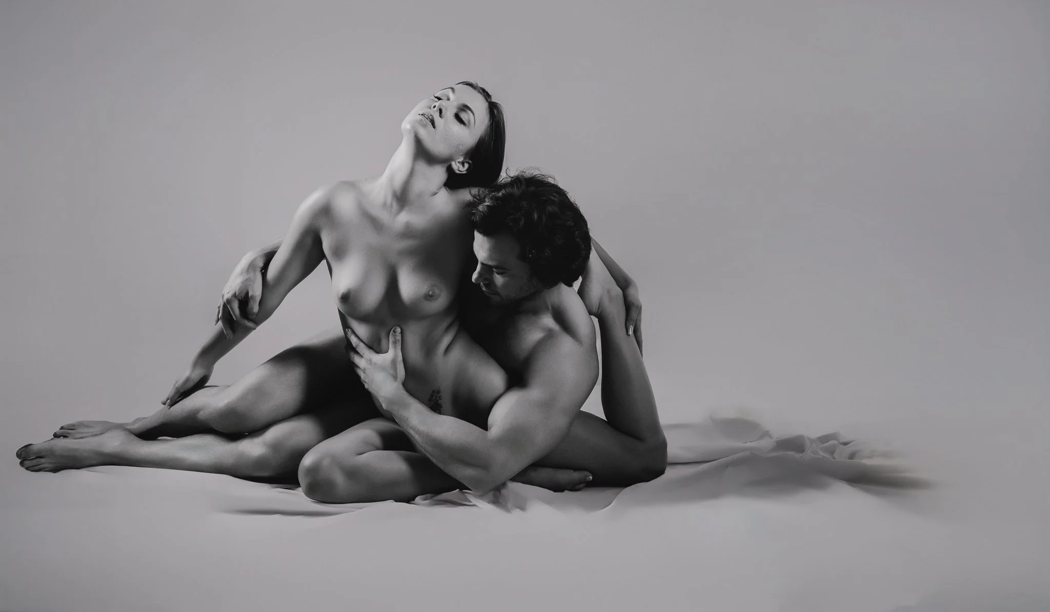 fine art nude of man and woman in black and white