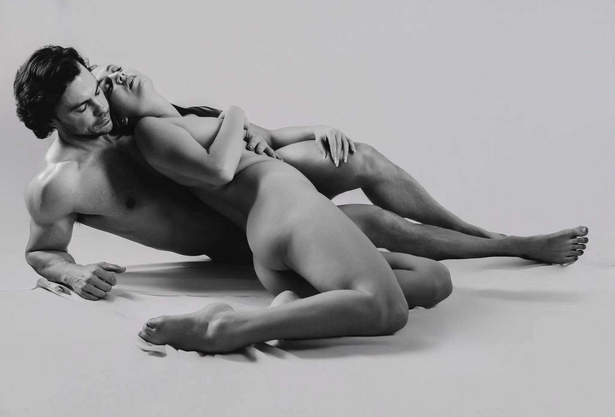 nude man and woman in a fine art pose